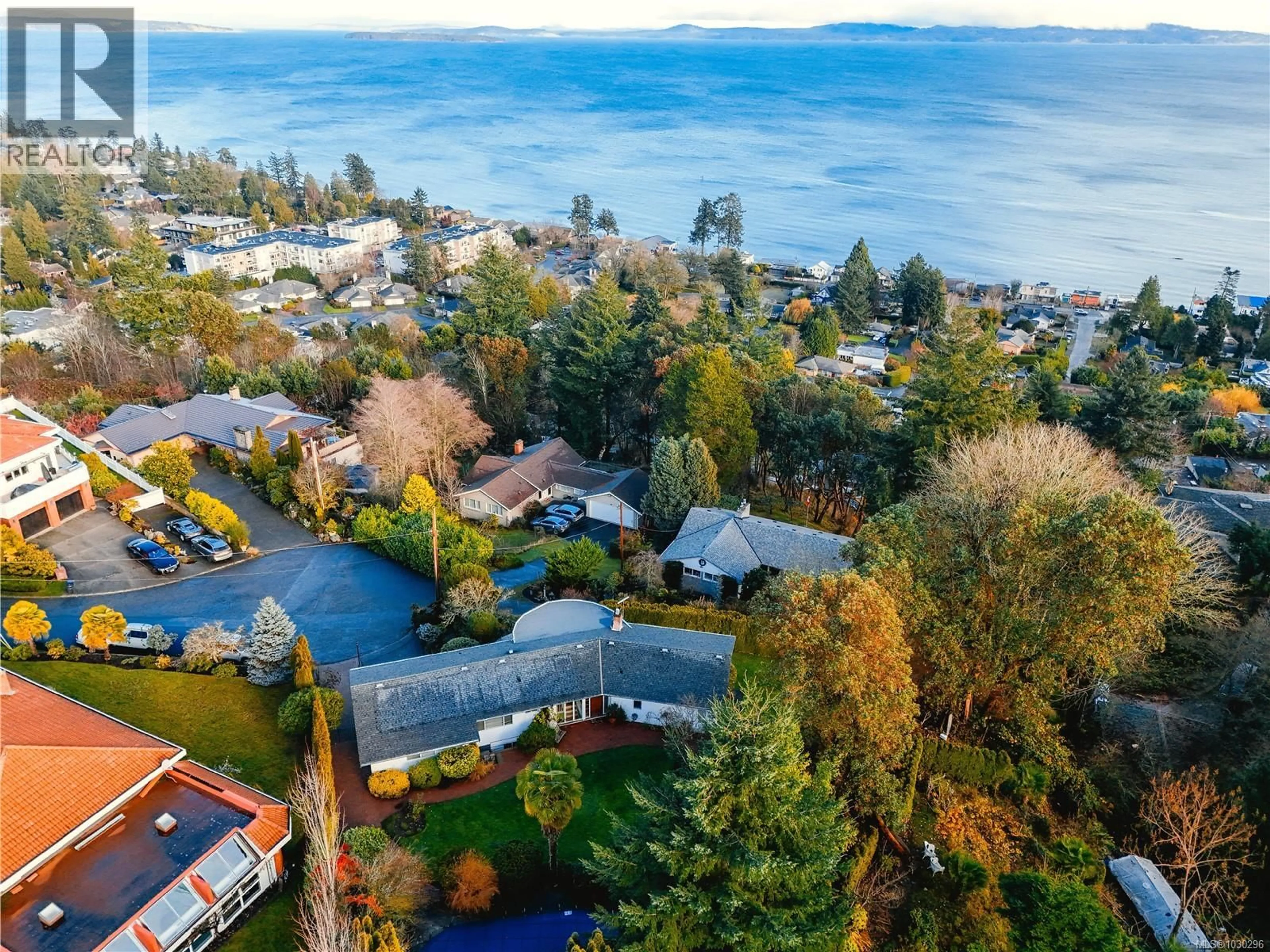 A pic from outside/outdoor area/front of a property/back of a property/a pic from drone, water/lake/river/ocean view for 5054 CATALINA TERRACE, Saanich British Columbia V8Y2A5