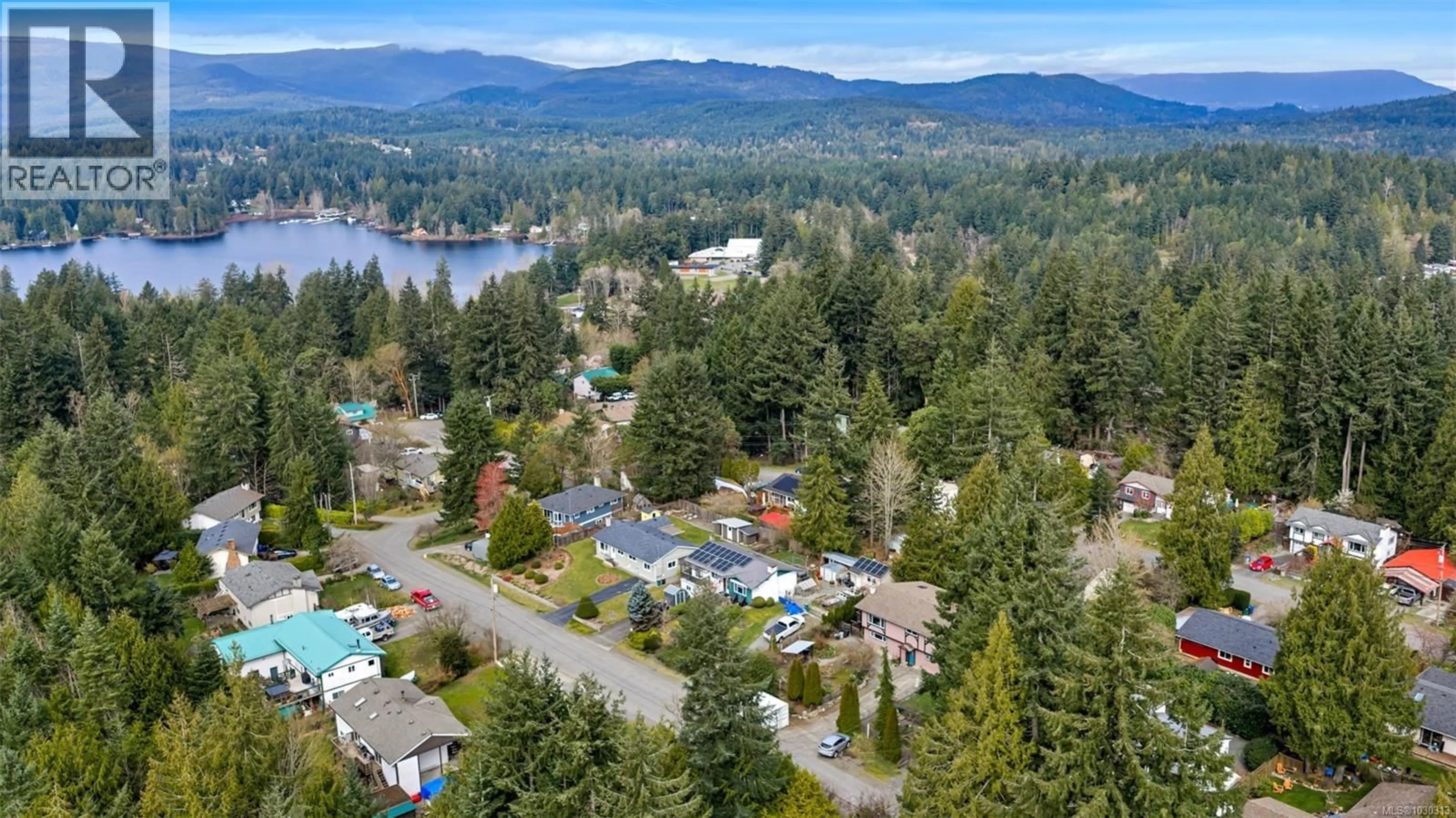 A pic from outside/outdoor area/front of a property/back of a property/a pic from drone, water/lake/river/ocean view for 1707 ROBIN HILL DRIVE, Shawnigan Lake British Columbia V8H3B5