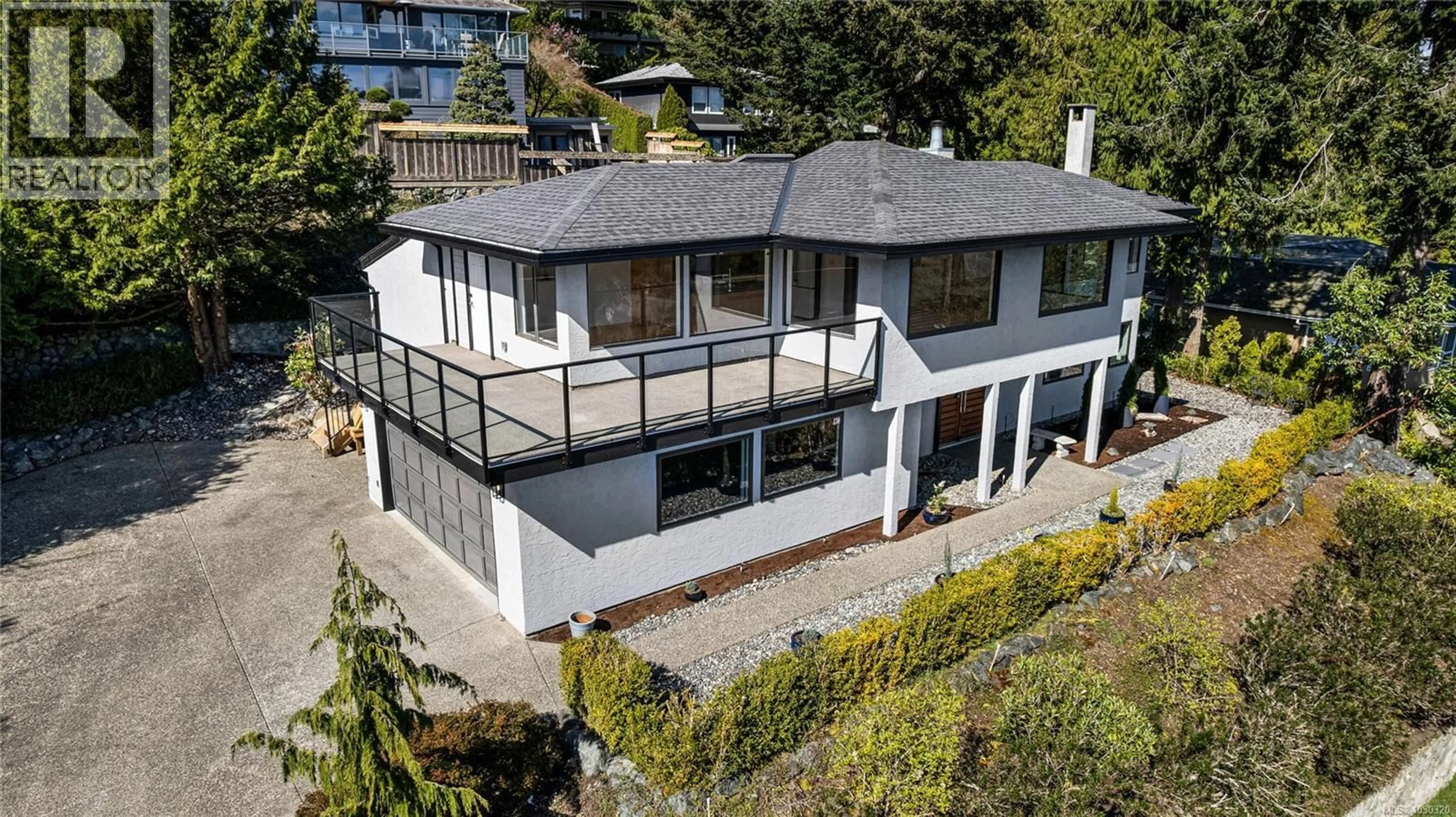 A pic from outside/outdoor area/front of a property/back of a property/a pic from drone, street for 5198 BECKTON ROAD, Saanich British Columbia V8Y2C1