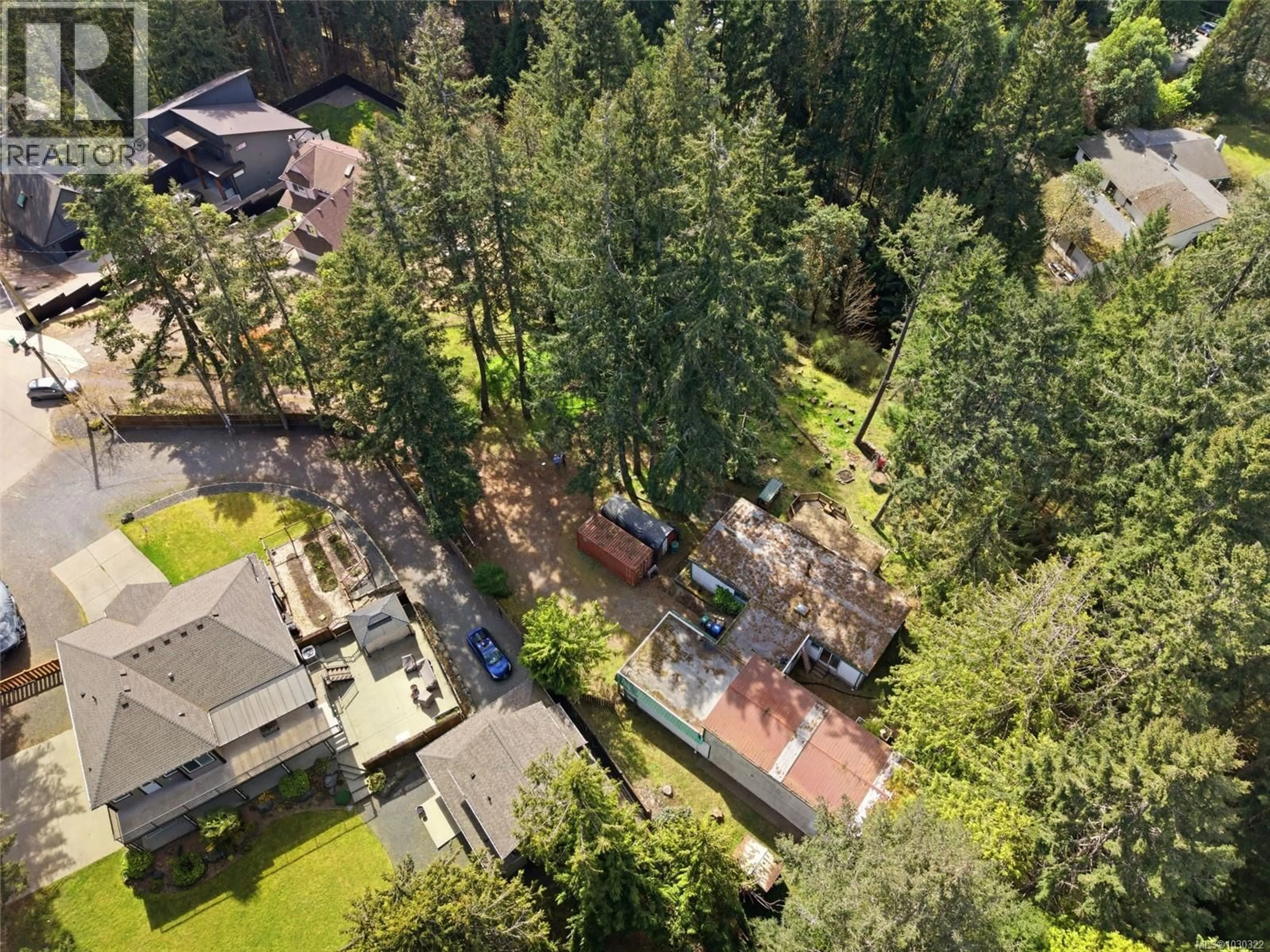 A pic from outside/outdoor area/front of a property/back of a property/a pic from drone, forest/trees view for 69 LAKE PLACE, Nanaimo British Columbia V9T5S1
