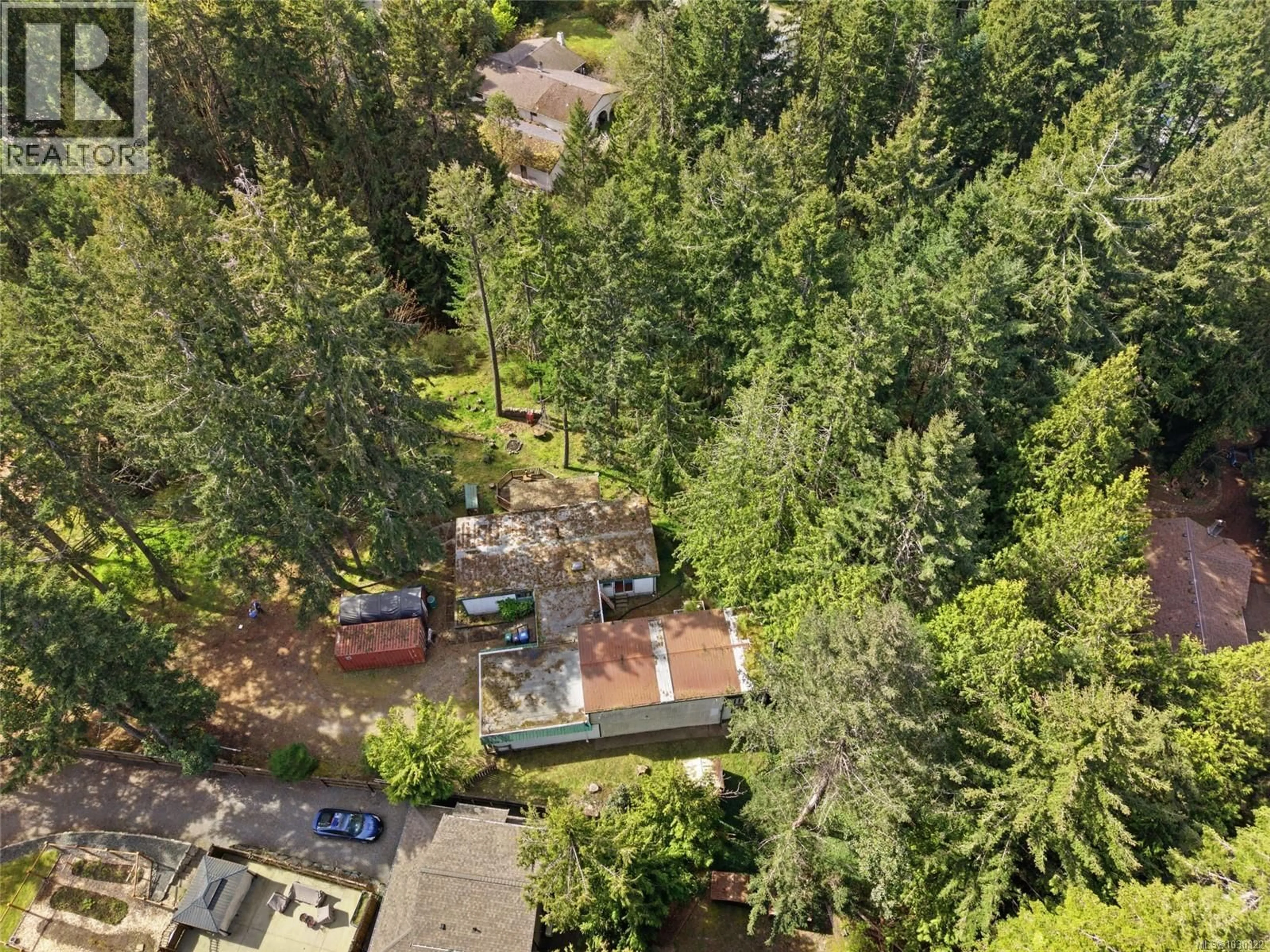 A pic from outside/outdoor area/front of a property/back of a property/a pic from drone, forest/trees view for 69 LAKE PLACE, Nanaimo British Columbia V9T5S1