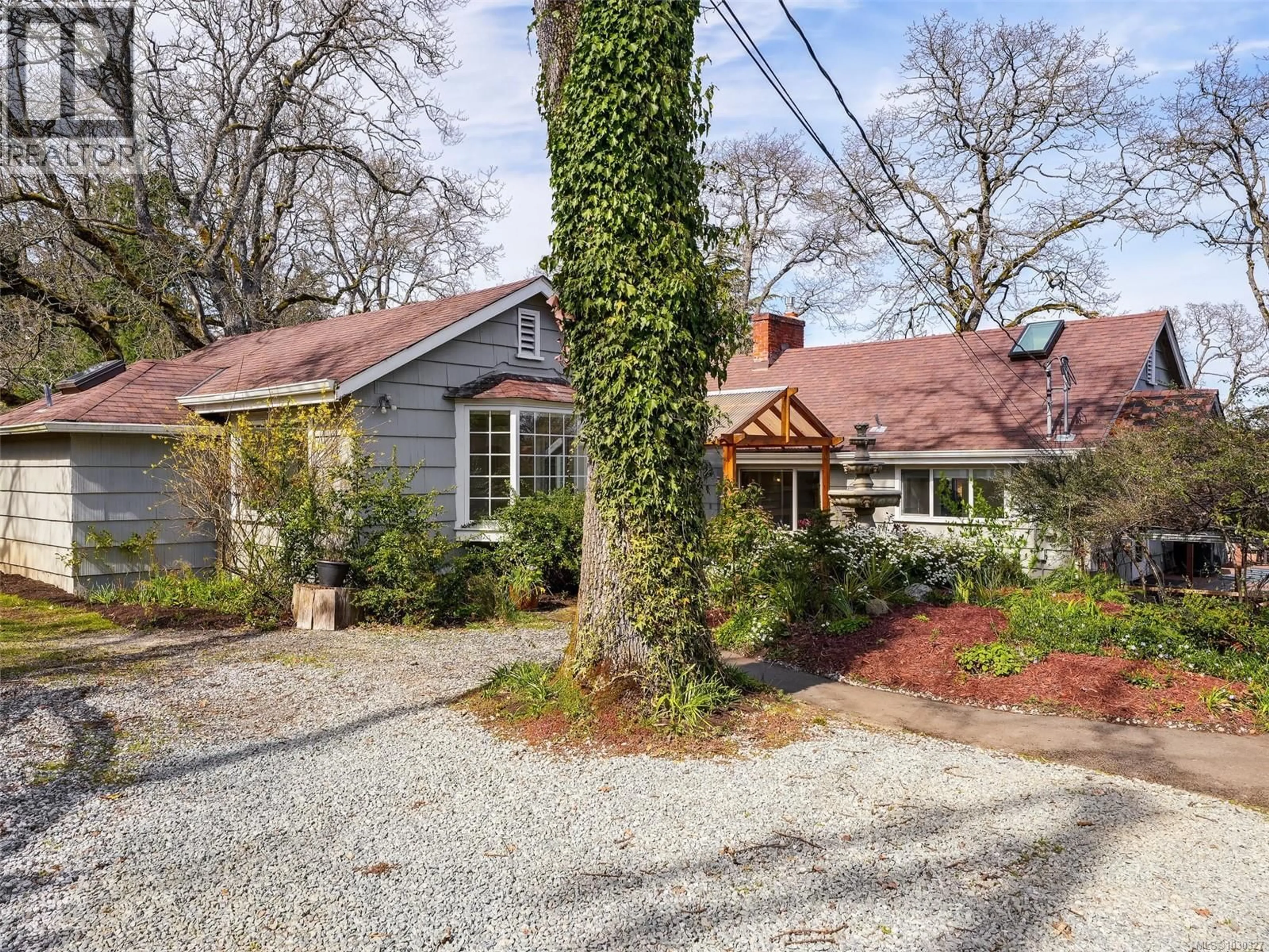 Home with brick exterior material, street for 4081 CEDAR HILL ROAD, Saanich British Columbia V8N3C2