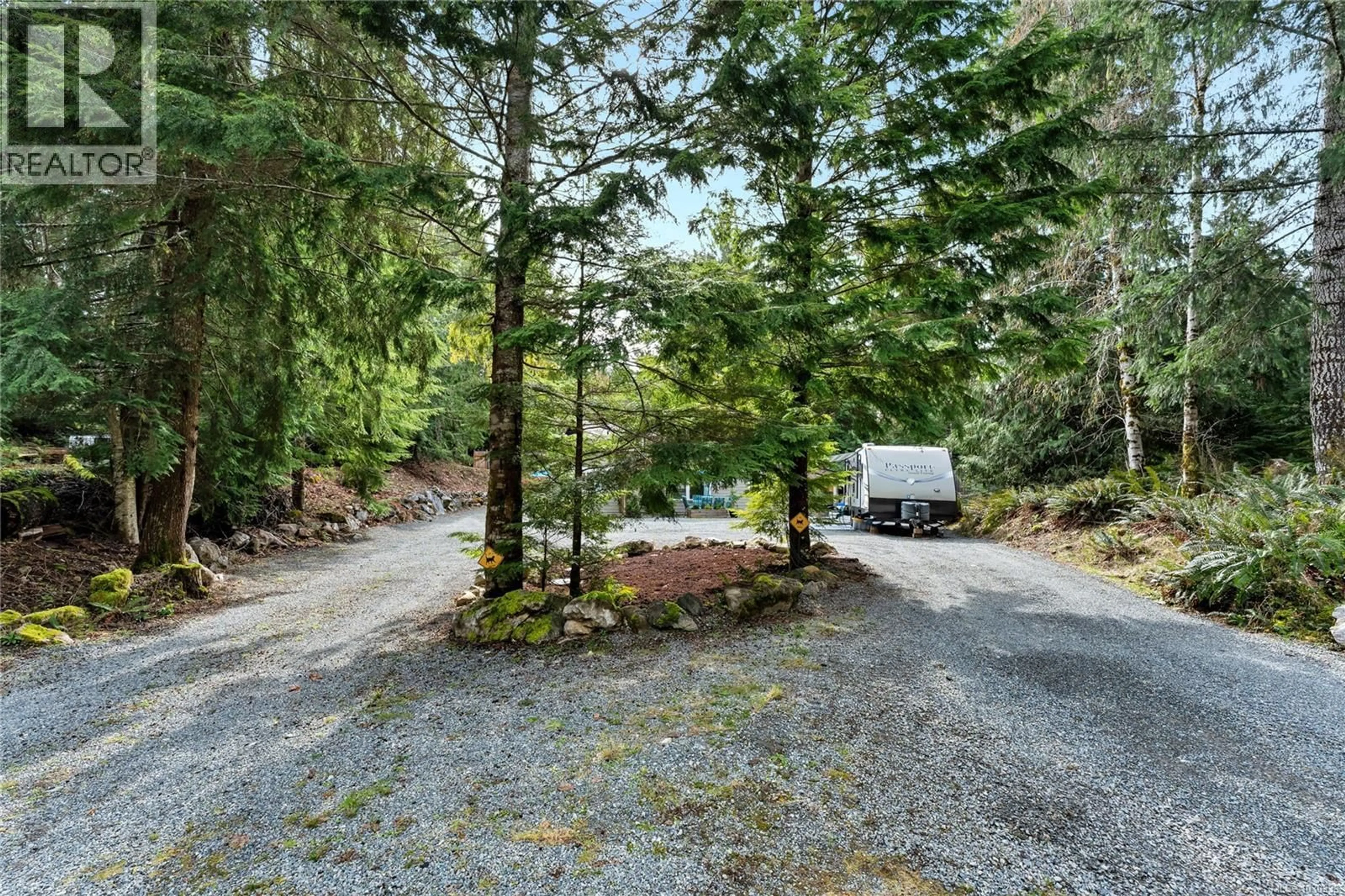 A pic from outside/outdoor area/front of a property/back of a property/a pic from drone, forest/trees view for 9296 WIDGEON WAY, Lake Cowichan British Columbia V0R2G0