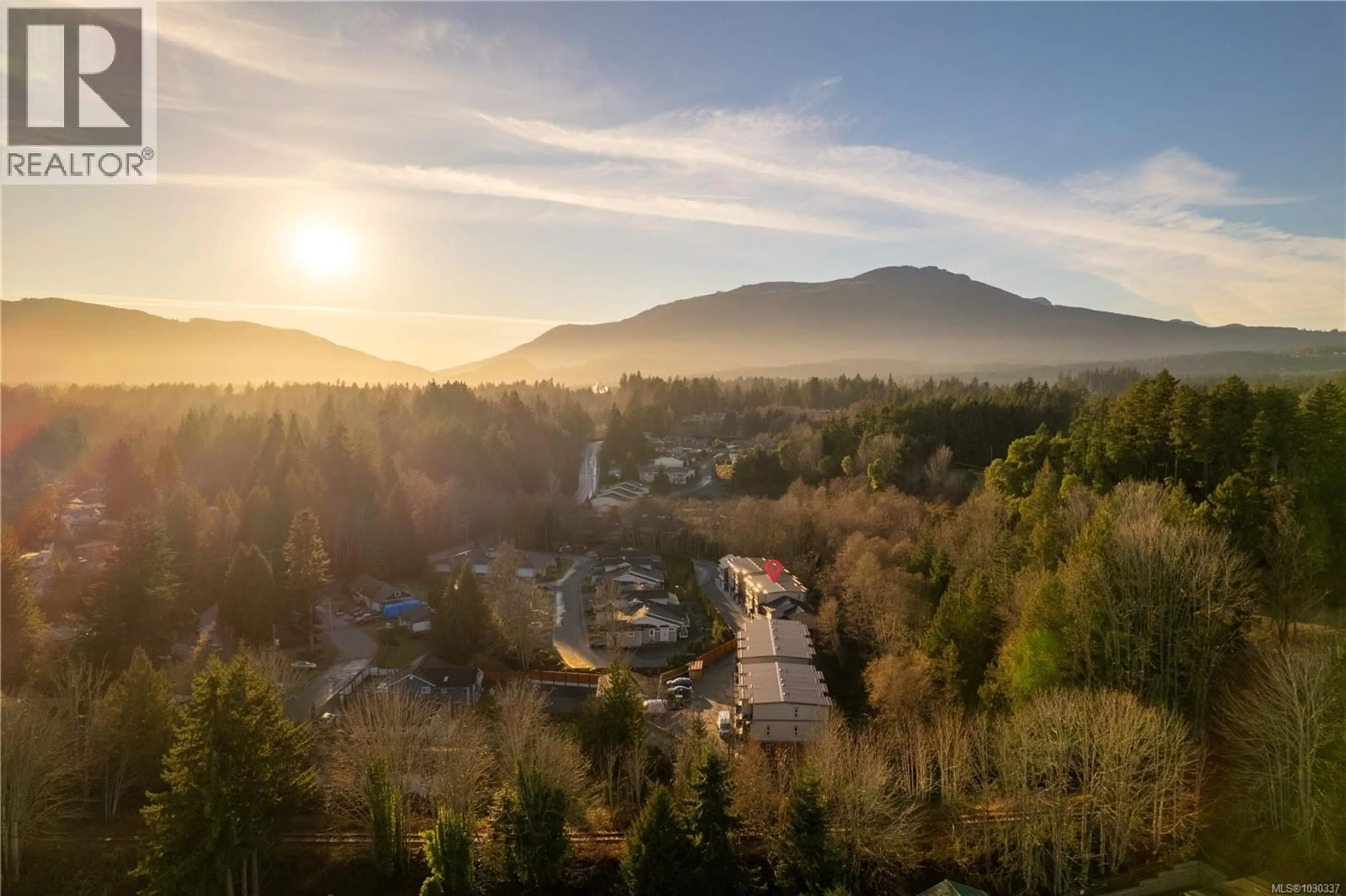 A pic from outside/outdoor area/front of a property/back of a property/a pic from drone, mountain view for 107 - 2899 RIVER ROAD, Chemainus British Columbia V0R1K3