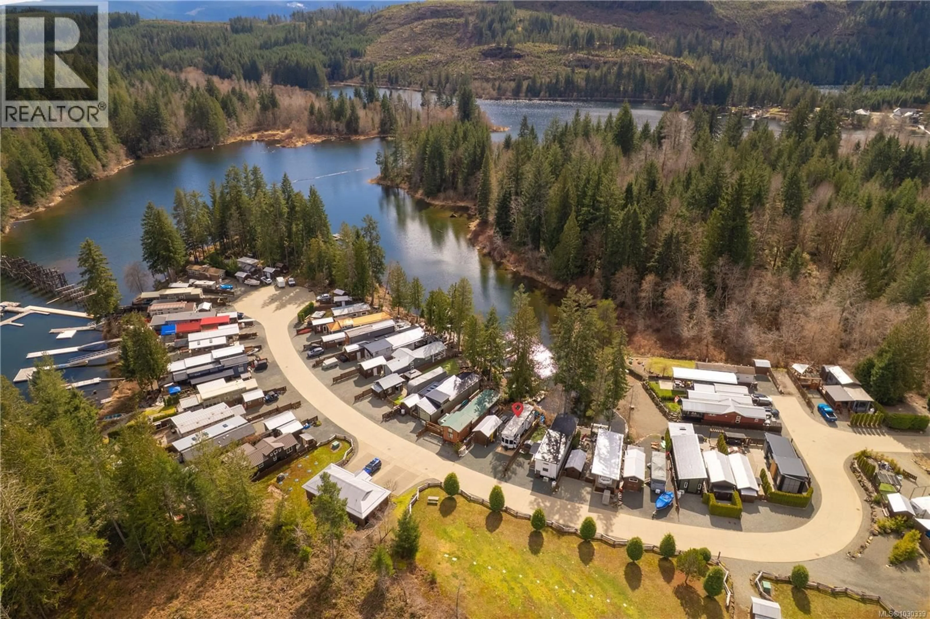 A pic from outside/outdoor area/front of a property/back of a property/a pic from drone, water/lake/river/ocean view for 23 - 10750 CENTRAL LAKE ROAD, Port Alberni British Columbia V9Y8Z2