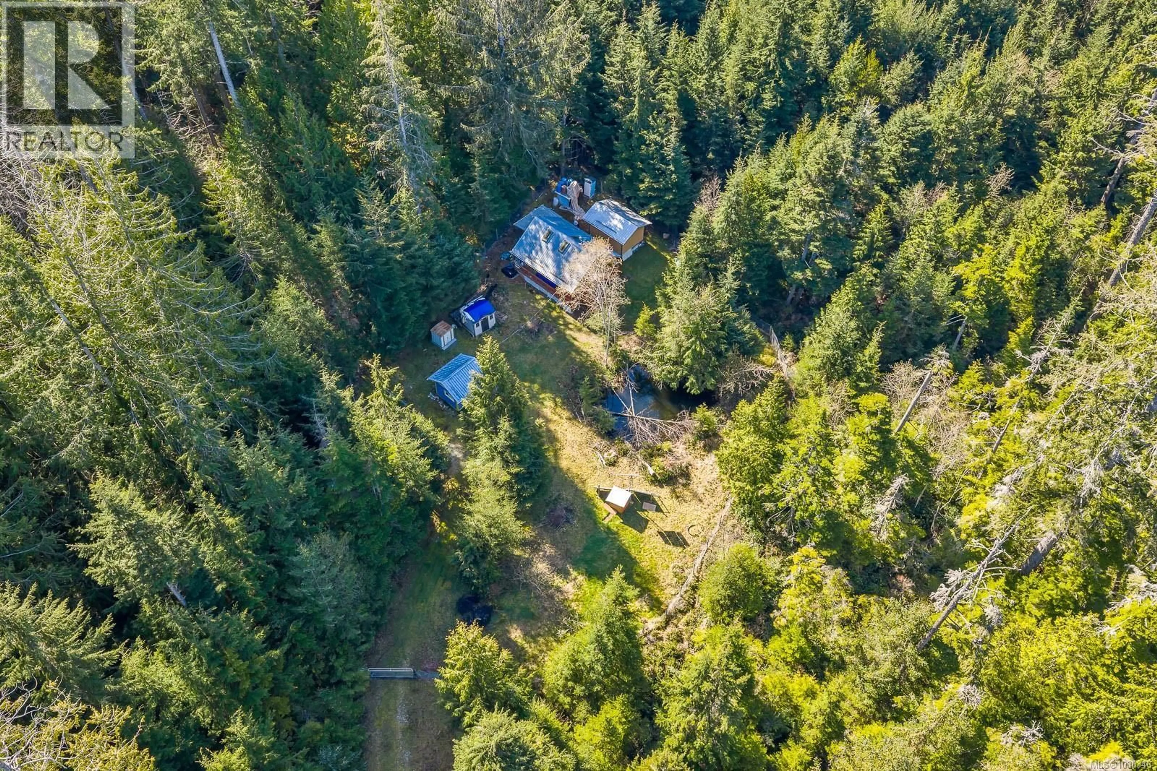 A pic from outside/outdoor area/front of a property/back of a property/a pic from drone, forest/trees view for 1632 CARRINGTON BAY ROAD, Cortes Island British Columbia V0P1Z0
