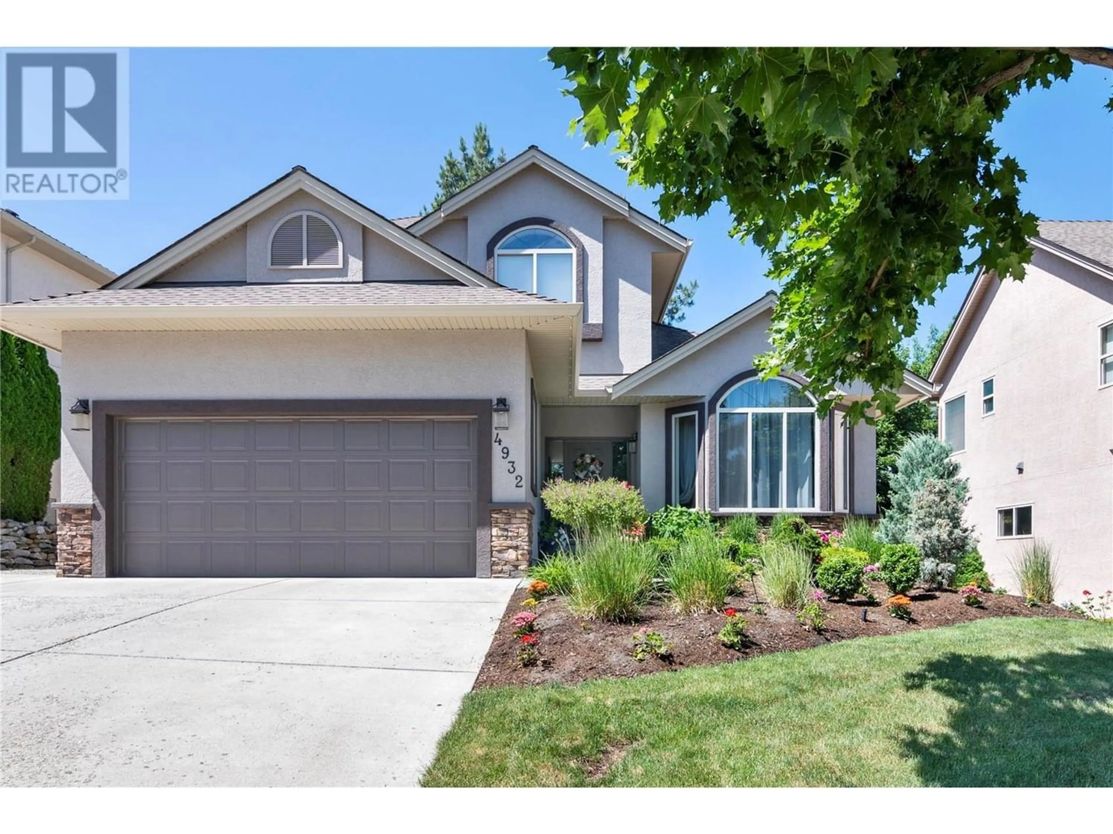 Frontside or backside of a home for 4932 Windsong Crescent, Kelowna British Columbia V1W4Y2