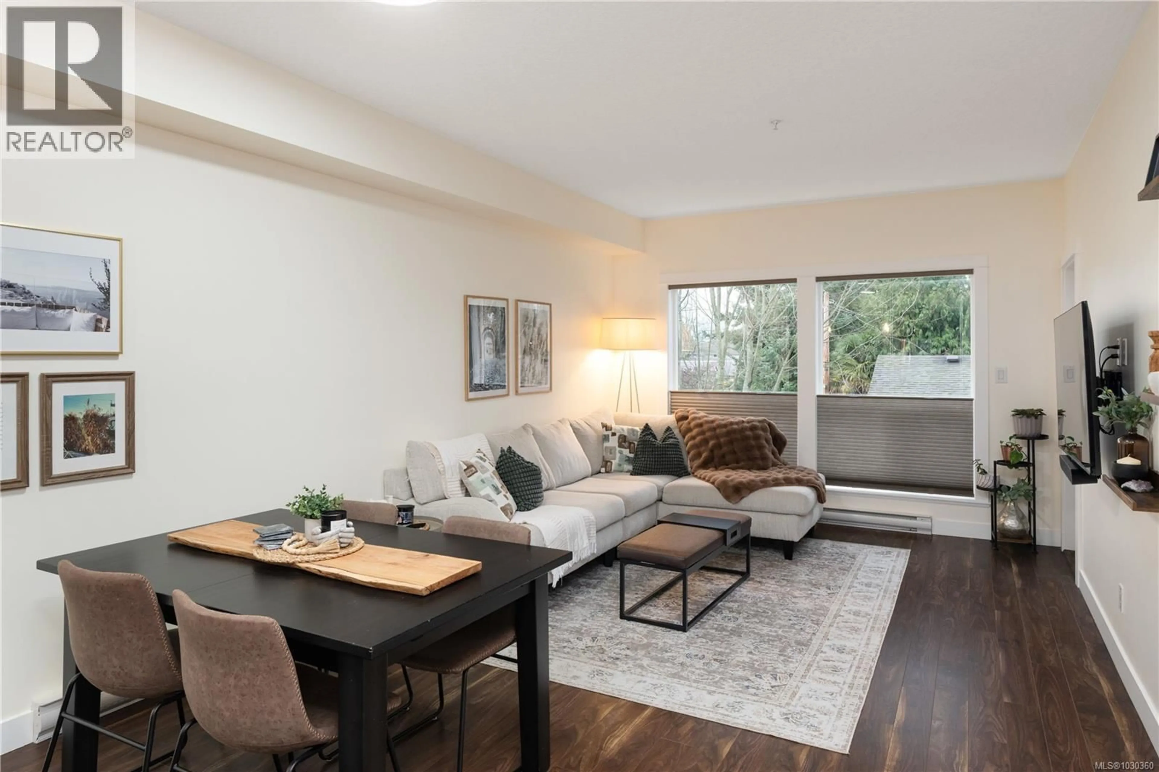 Living room with furniture, wood/laminate floor for 213 - 938 DUNFORD AVENUE, Langford British Columbia V9B2S3