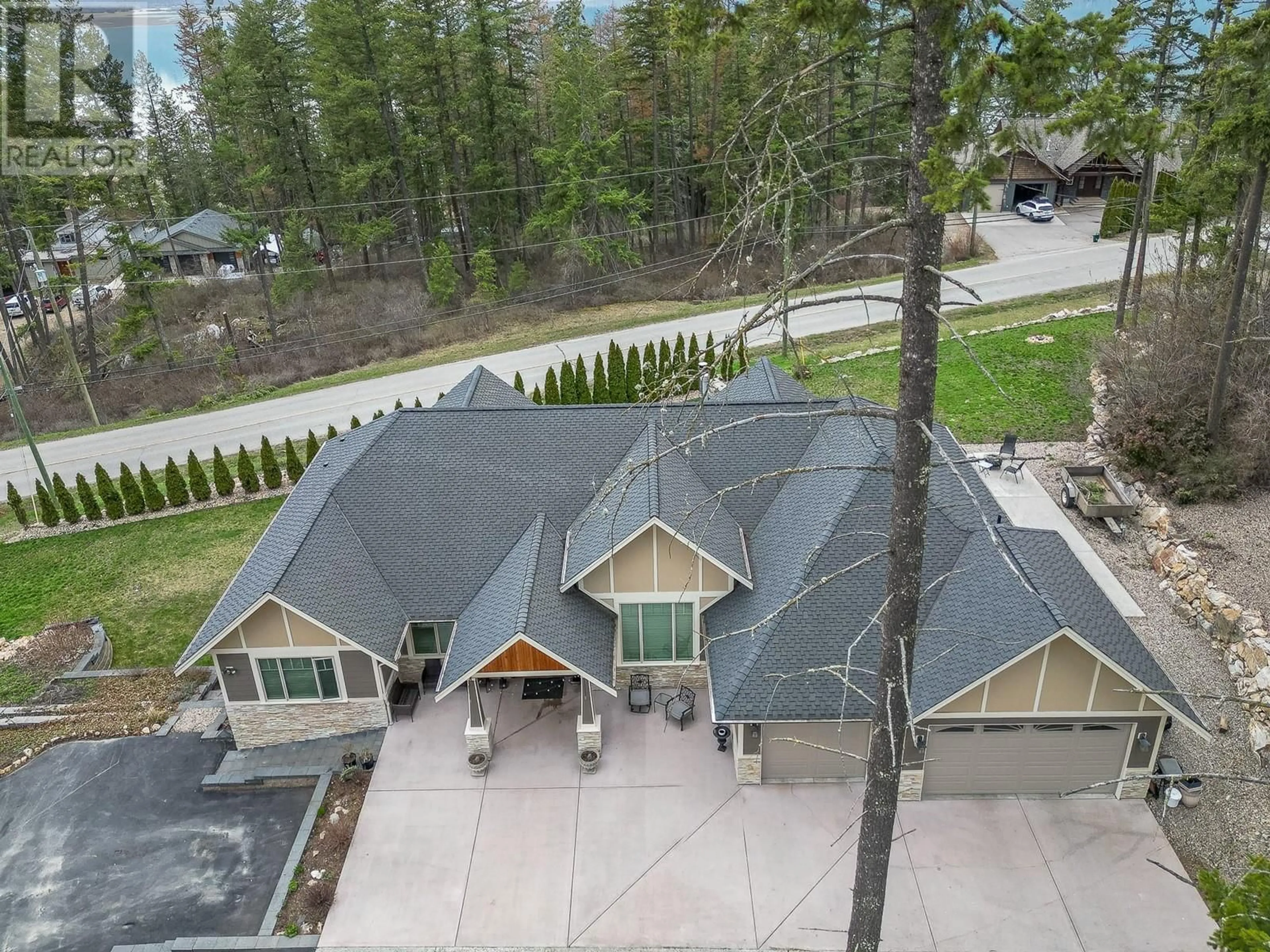A pic from outside/outdoor area/front of a property/back of a property/a pic from drone, mountain view for 3131 20 STREET NORTHEAST, Salmon Arm British Columbia V1E2G9