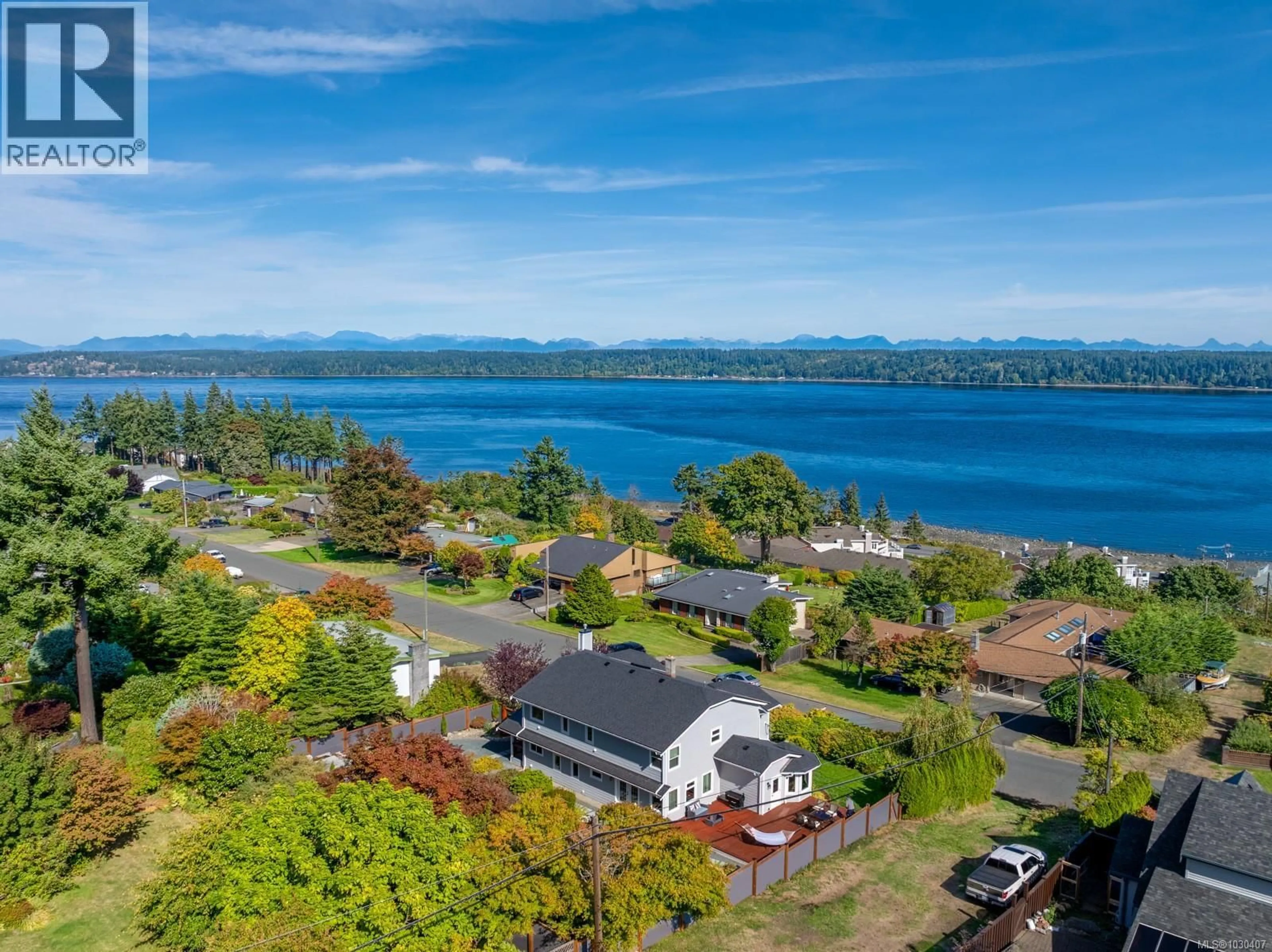 A pic from outside/outdoor area/front of a property/back of a property/a pic from drone, water/lake/river/ocean view for 392 CARNEGIE STREET, Campbell River British Columbia V9W2J5