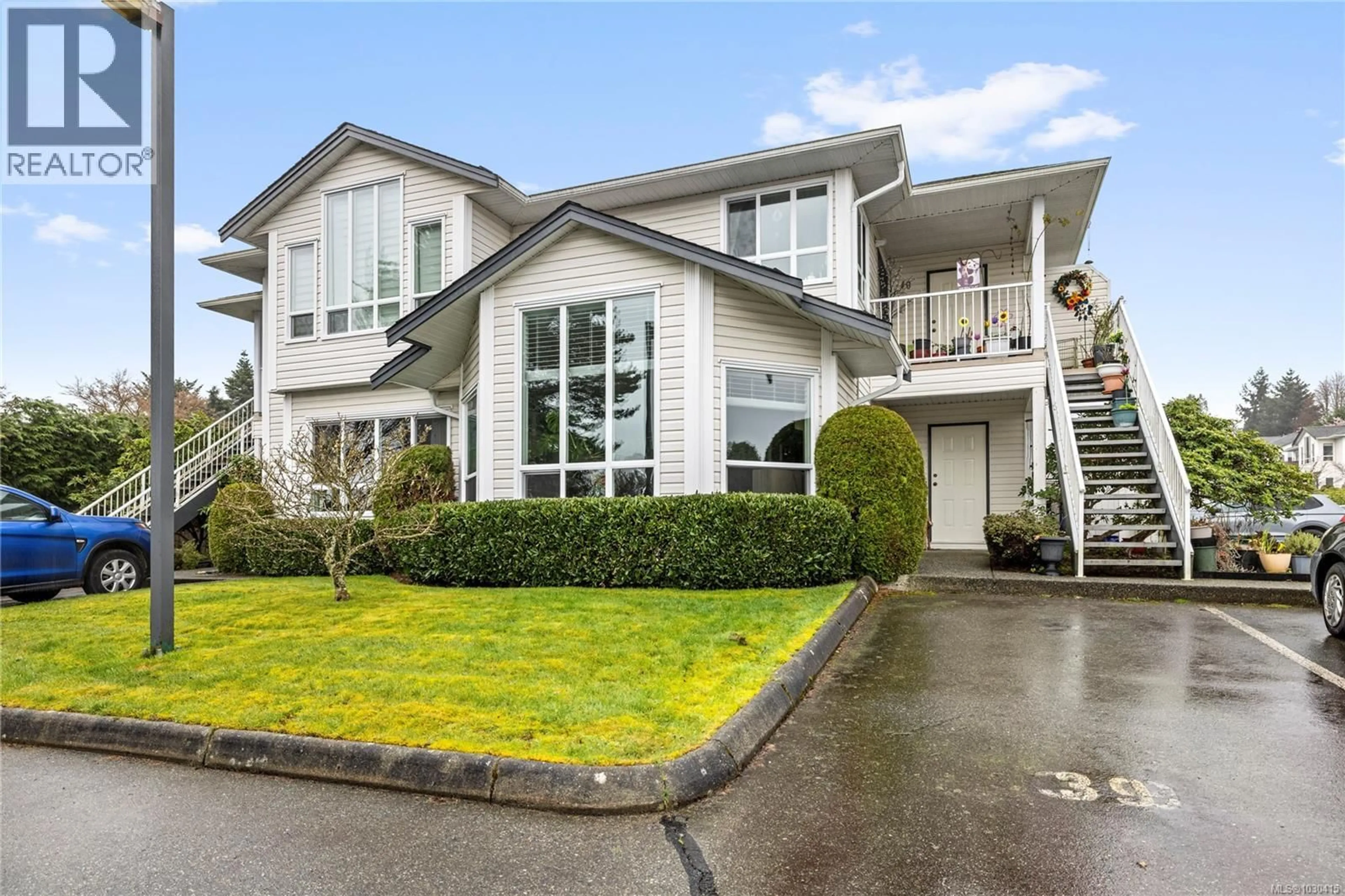 Home with vinyl exterior material, street for 39 - 6245 BLUEBACK ROAD, Nanaimo British Columbia V9V1N7