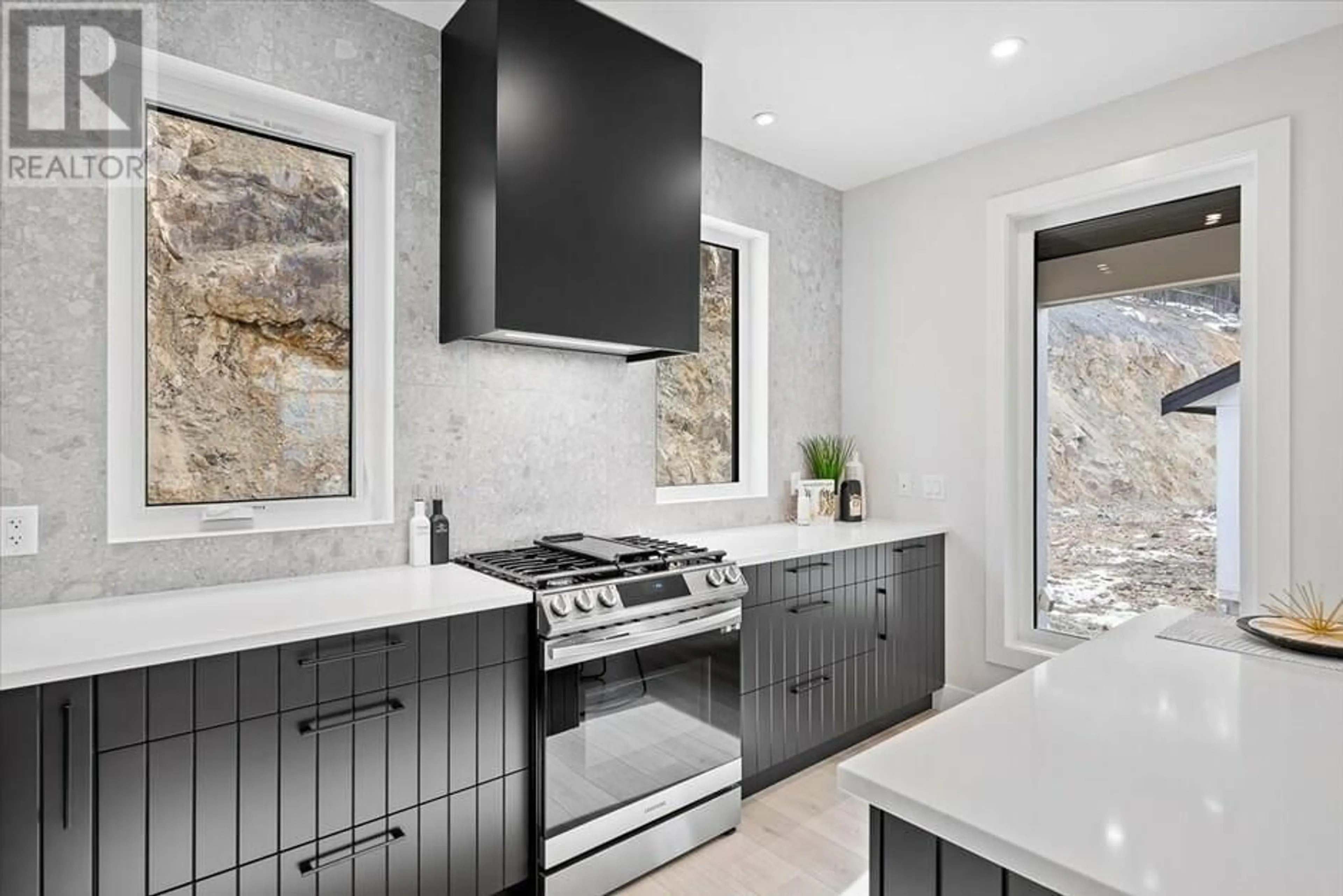 Contemporary kitchen, ceramic floors, mountain for 1165 Lone Pine Drive, Kelowna British Columbia V1P0A5