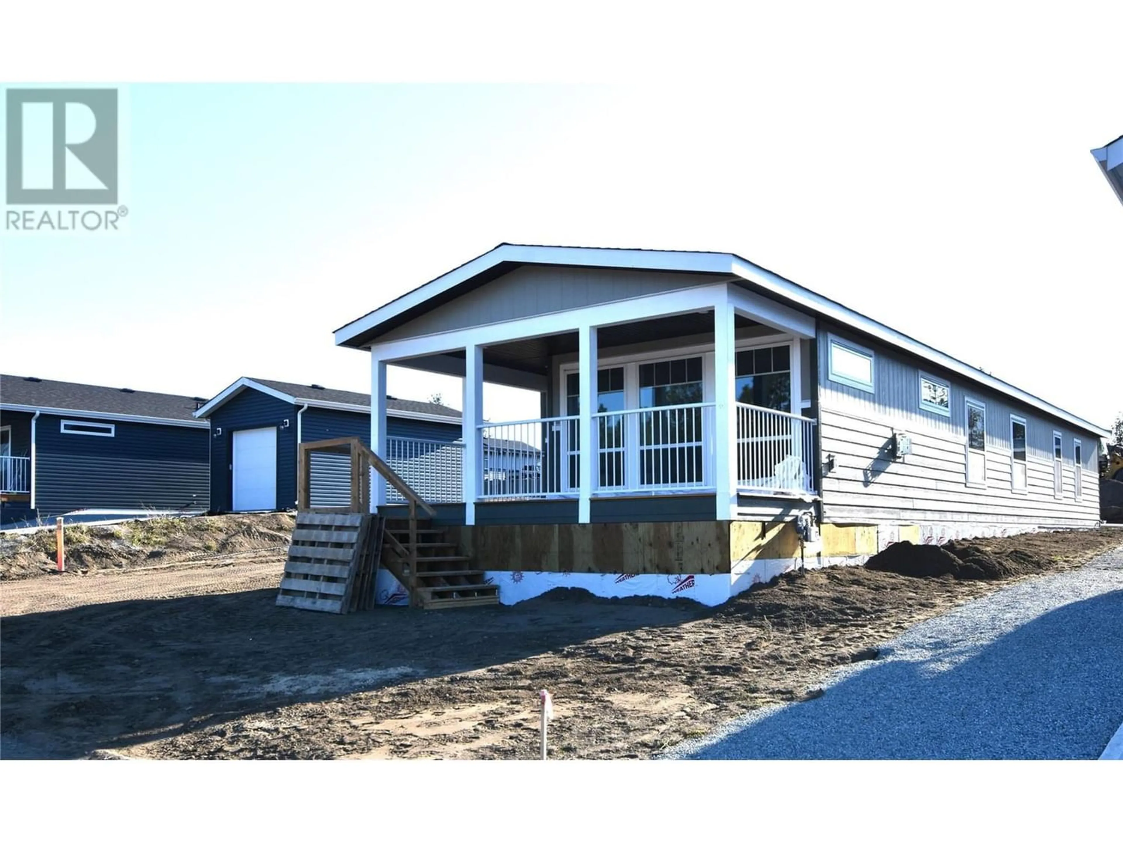 Home with vinyl exterior material for 9510 Highway 97 Unit# 194, Vernon British Columbia V1H1R8