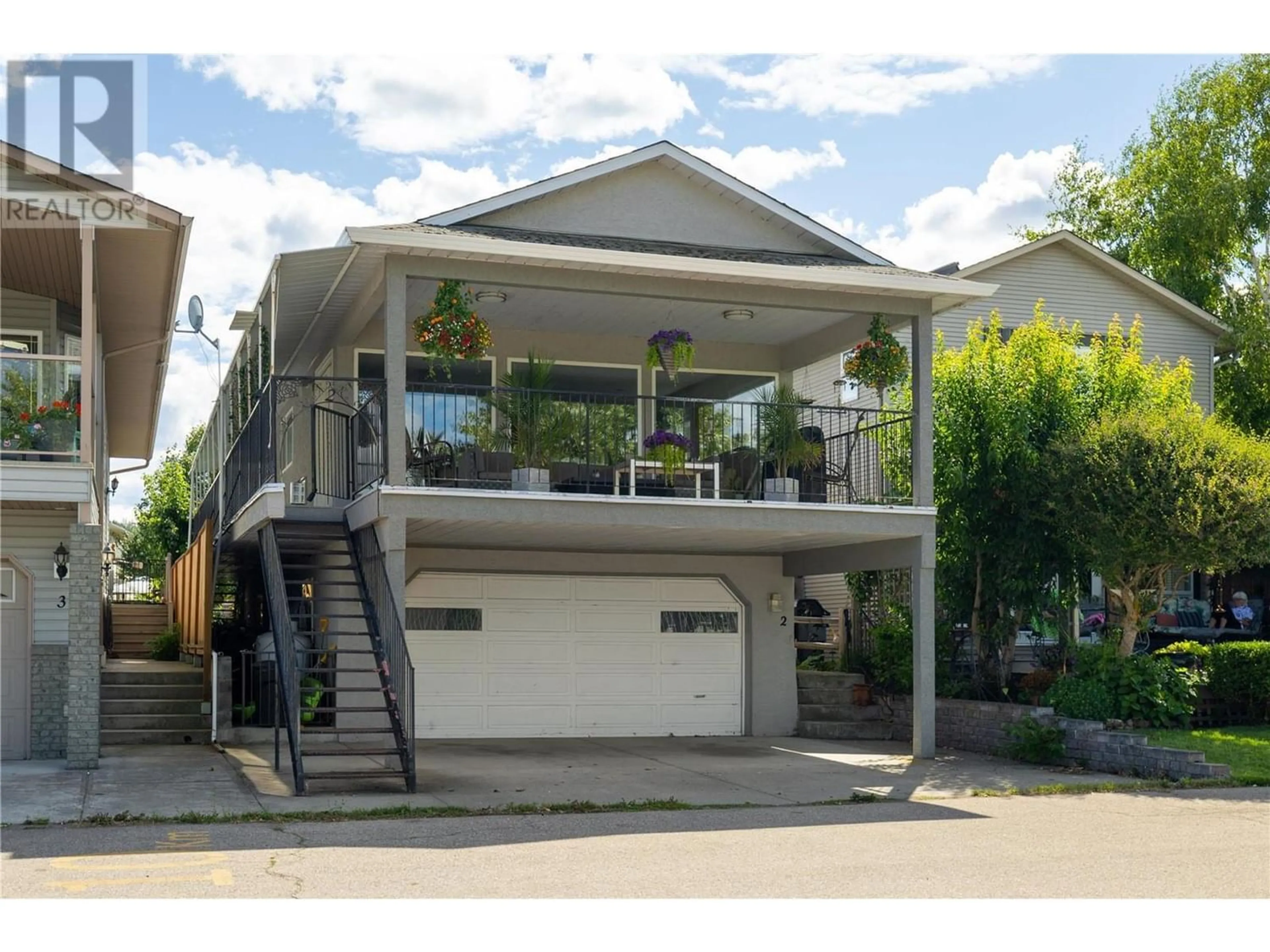 Frontside or backside of a home for 2 Lakeshore Drive, Vernon British Columbia V1H2A1