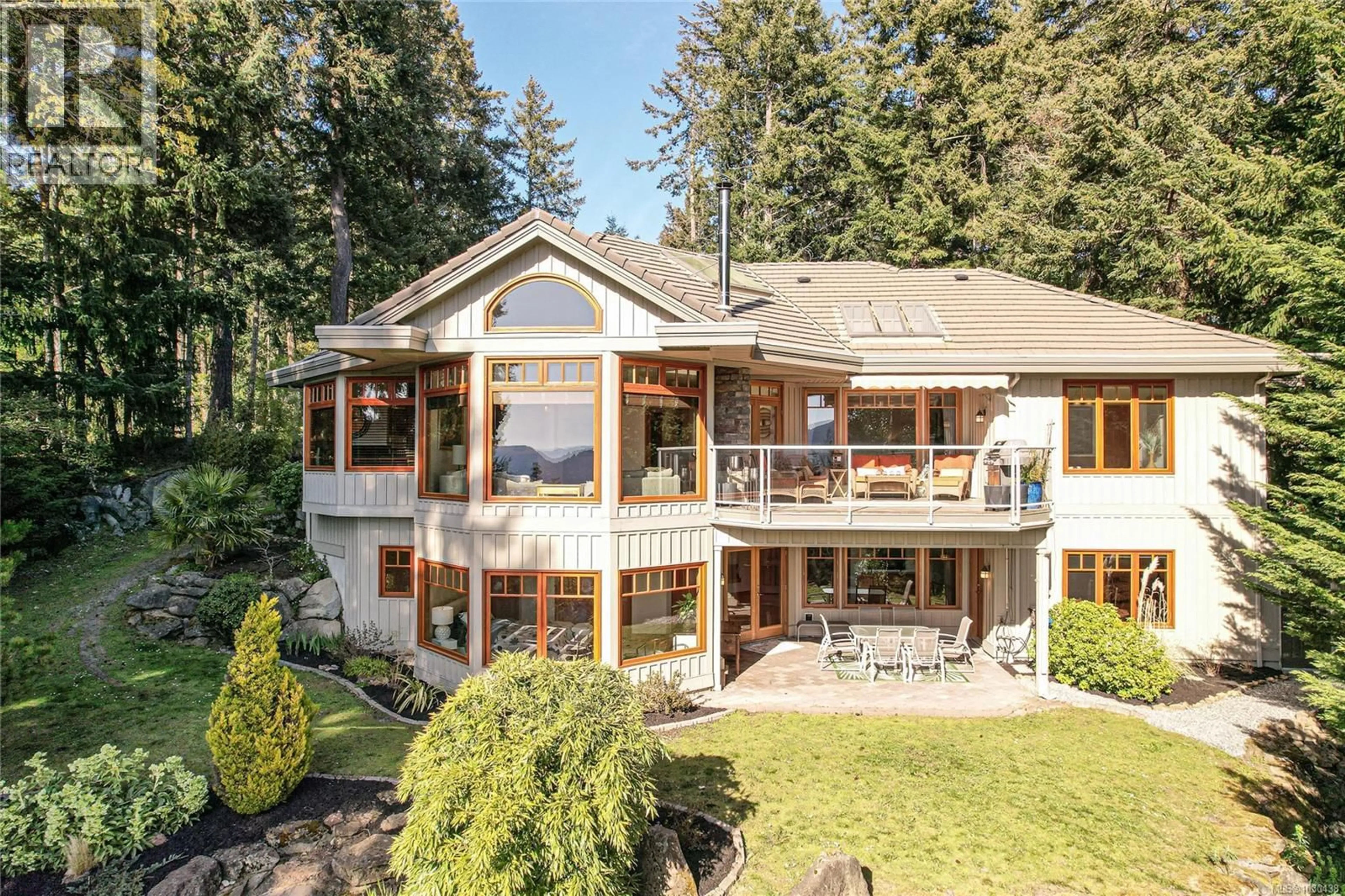 A pic from outside/outdoor area/front of a property/back of a property/a pic from drone, water/lake/river/ocean view for 119 QUAIL CRESCENT, Salt Spring British Columbia V8K2G4