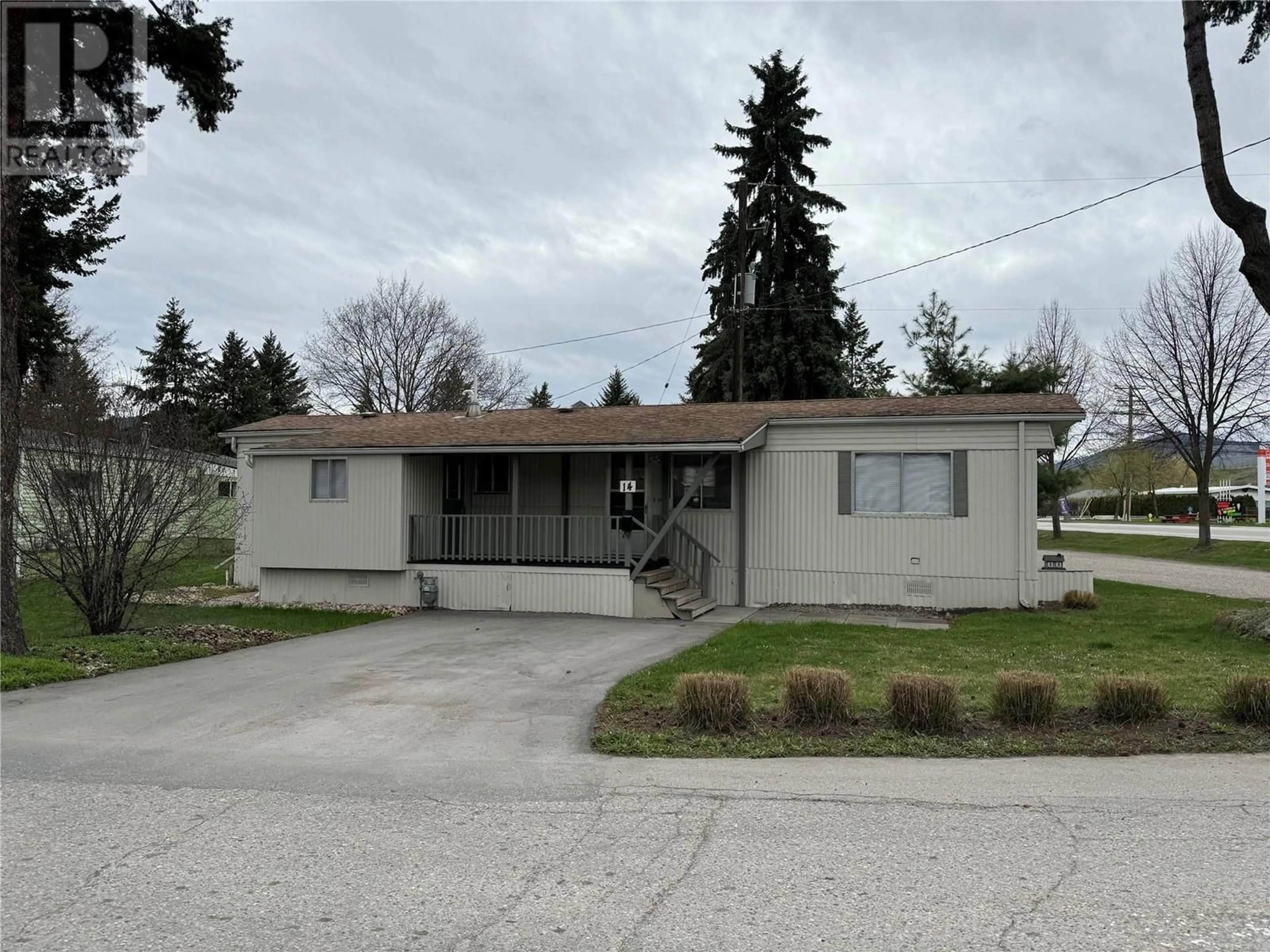 Home with vinyl exterior material, street for 14 - 5484 25 AVENUE, Vernon British Columbia V1T7A8