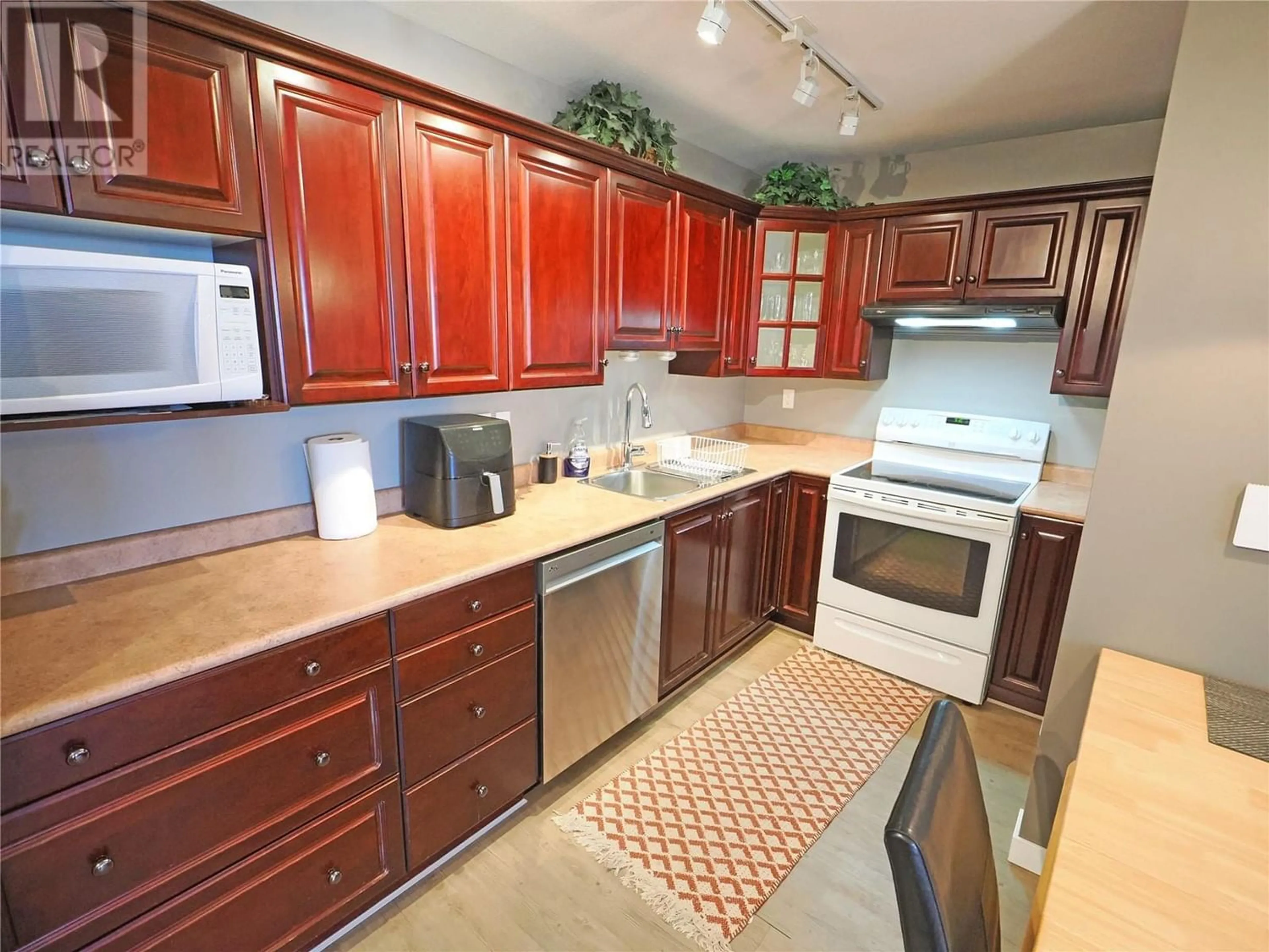 Standard kitchen, ceramic floors for 6375 Whiskey Jack Road Unit# 307, Big White British Columbia V1P1P3