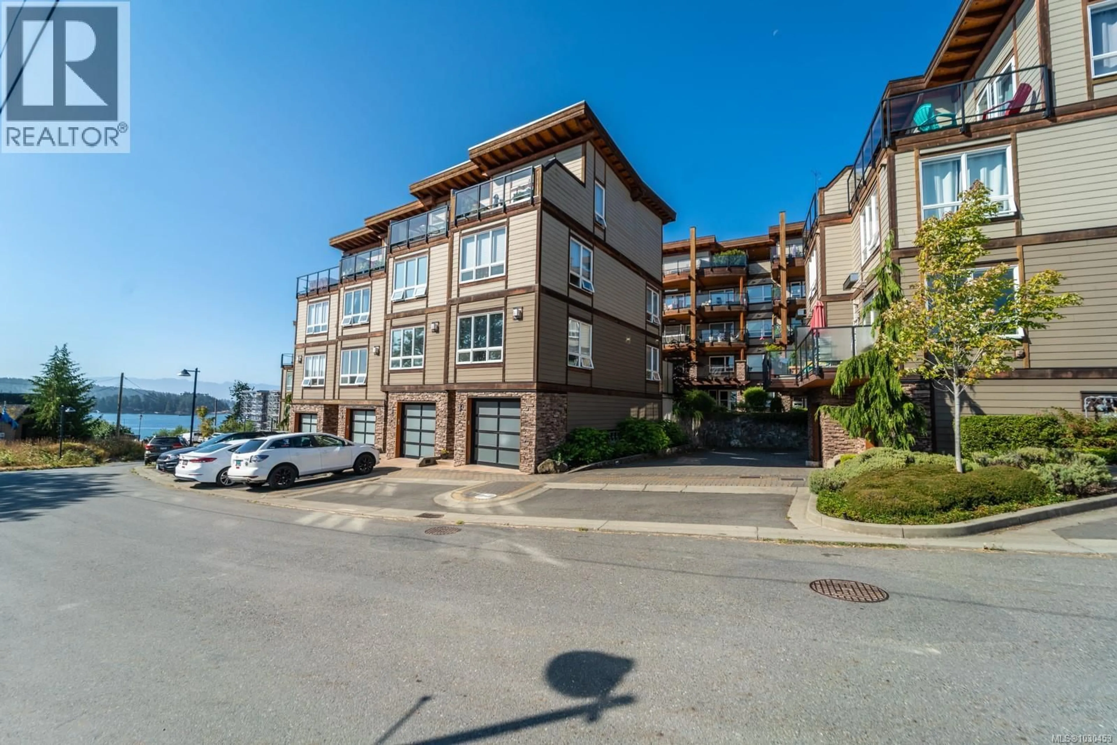 A pic from outside/outdoor area/front of a property/back of a property/a pic from drone, building for 204 - 6591 LINCROFT ROAD, Sooke British Columbia V9Z1M2