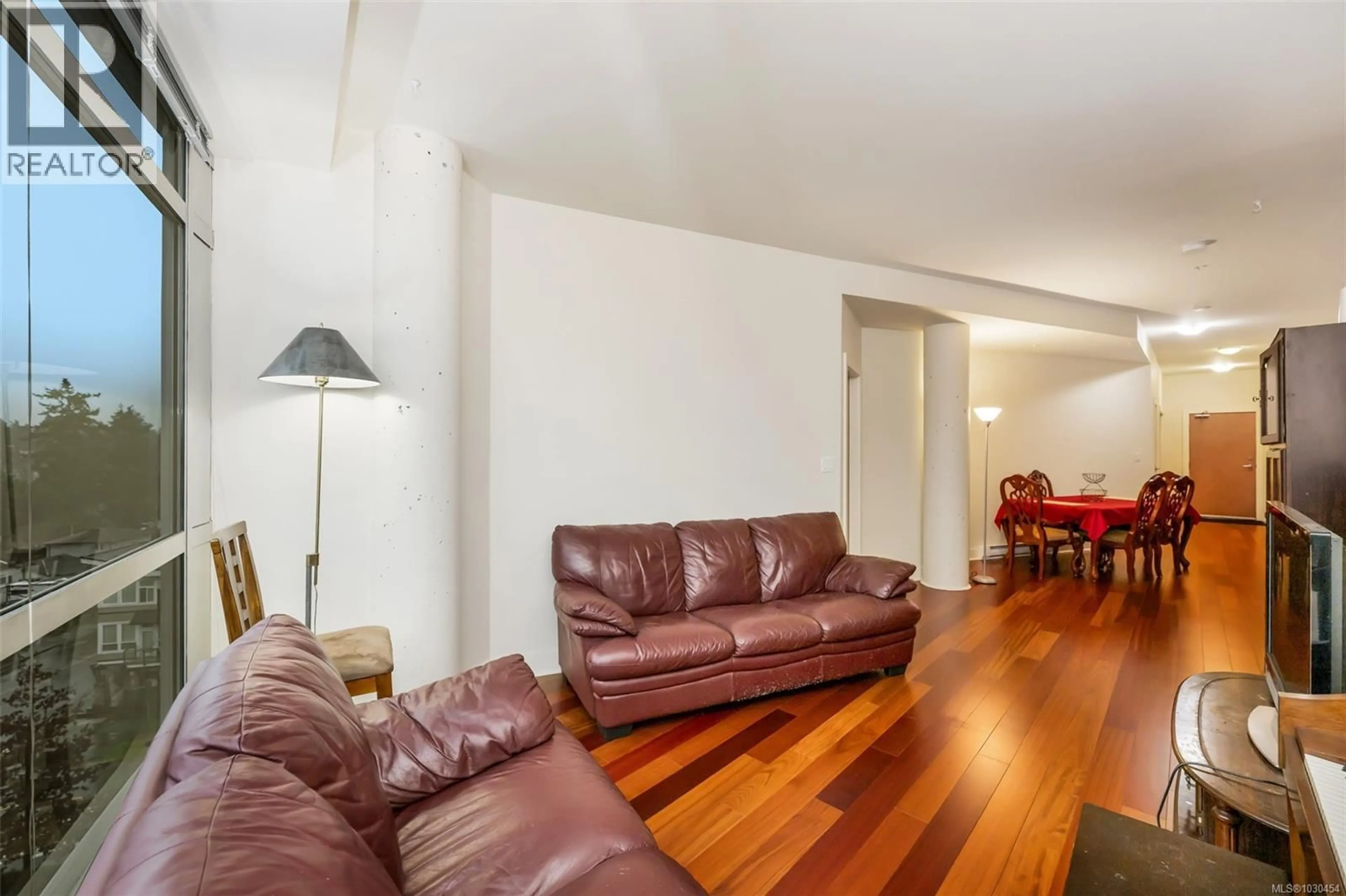 Living room with furniture, wood/laminate floor for 727 - 2745 VETERANS MEMORIAL PARKWAY, Langford British Columbia V9B0H4