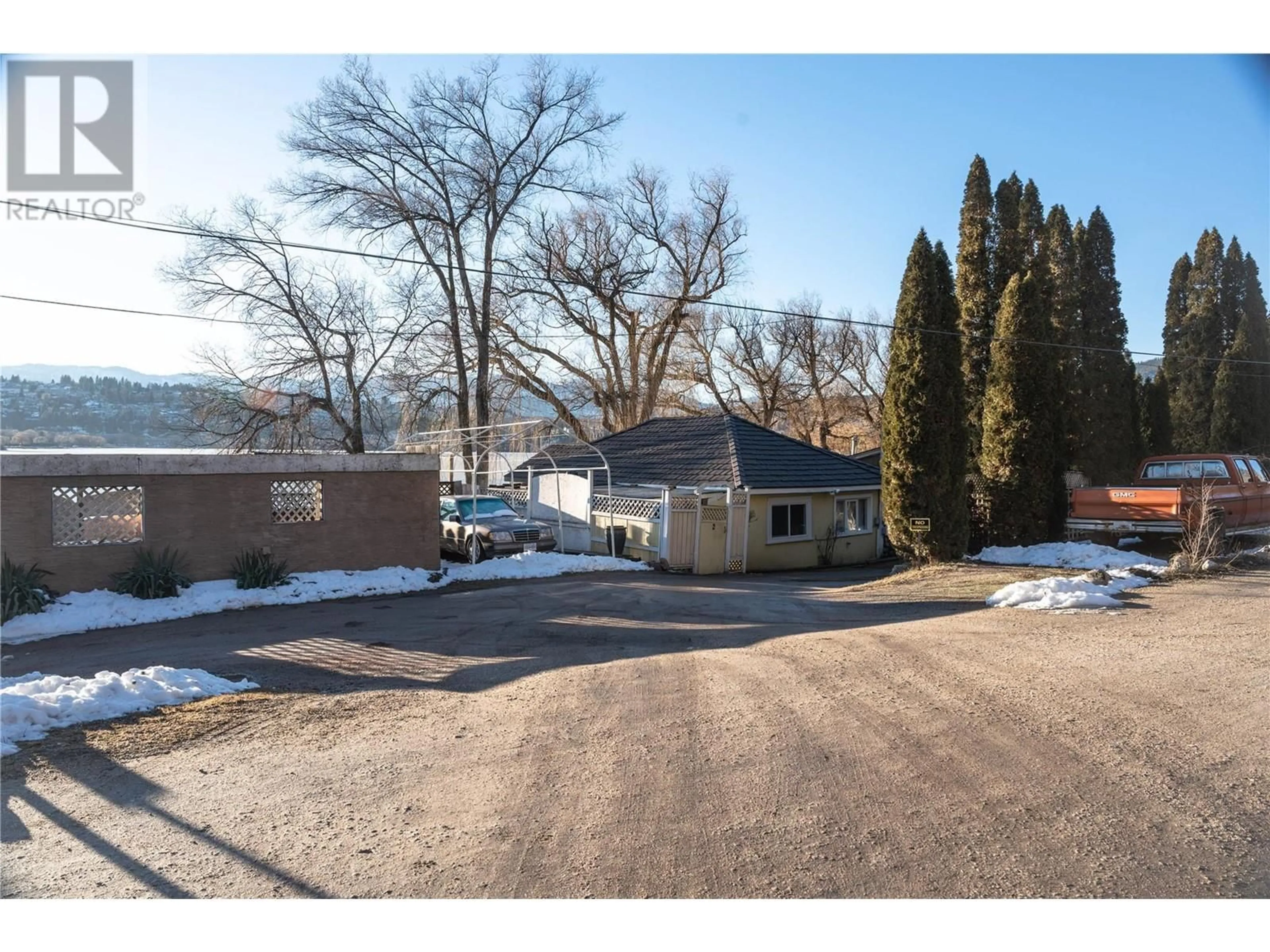 A pic from outside/outdoor area/front of a property/back of a property/a pic from drone, mountain view for 11910 WILLETT ROAD, Lake Country British Columbia V4V2A1