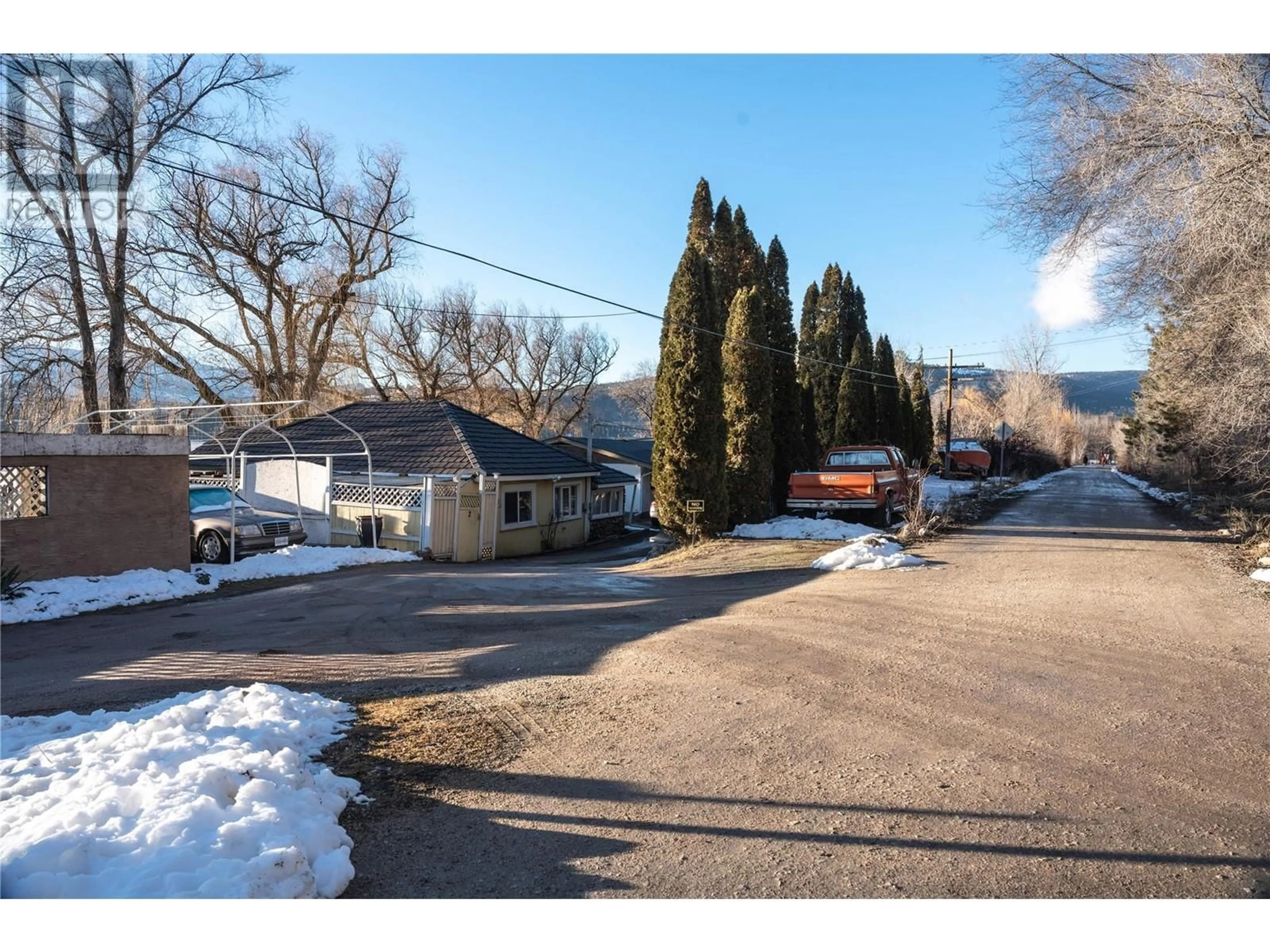 A pic from outside/outdoor area/front of a property/back of a property/a pic from drone, street for 11910 WILLETT ROAD, Lake Country British Columbia V4V2A1