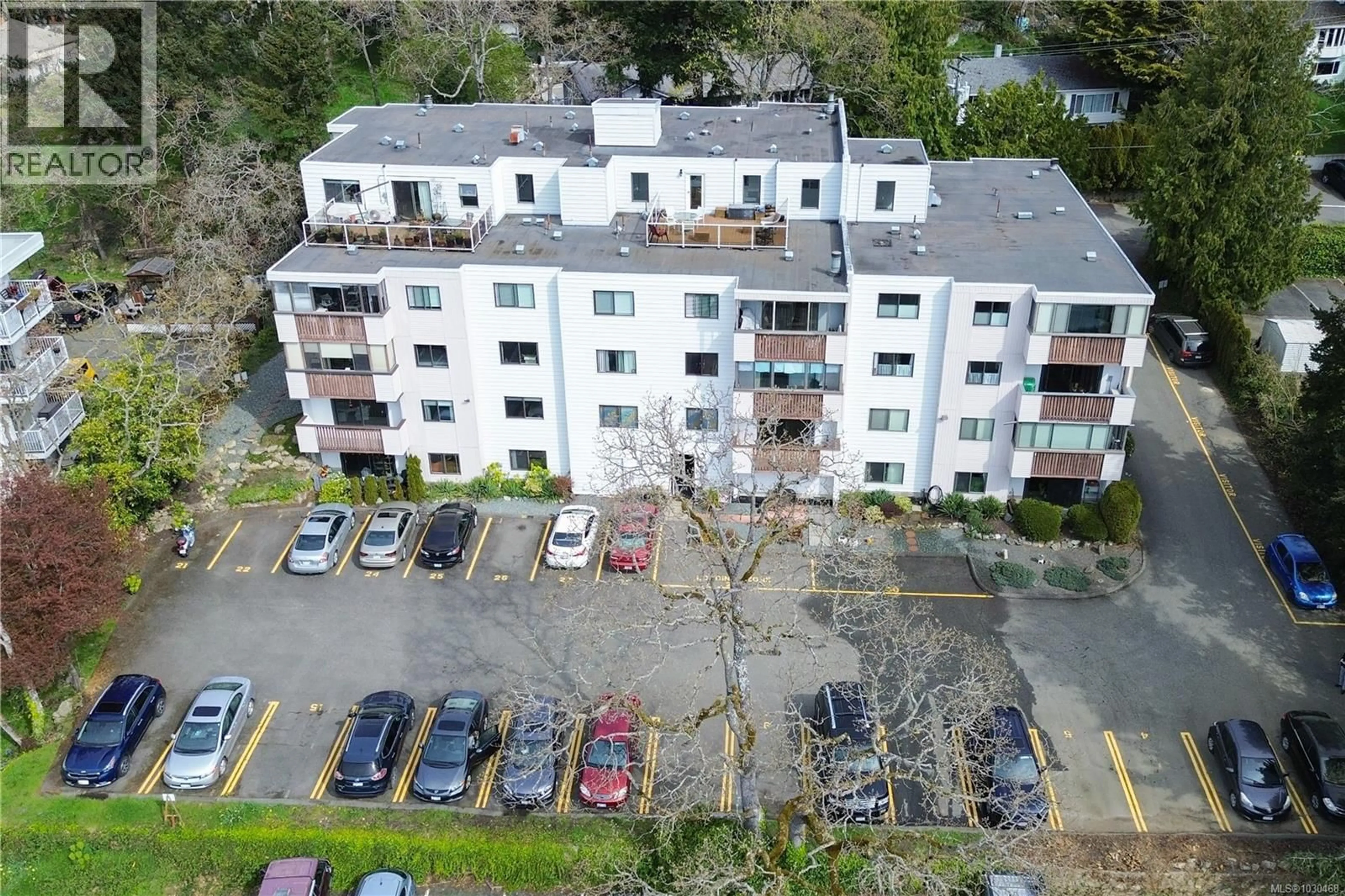 A pic from outside/outdoor area/front of a property/back of a property/a pic from drone, building for 404 - 614 FERNHILL PLACE, Esquimalt British Columbia V9A4Z1