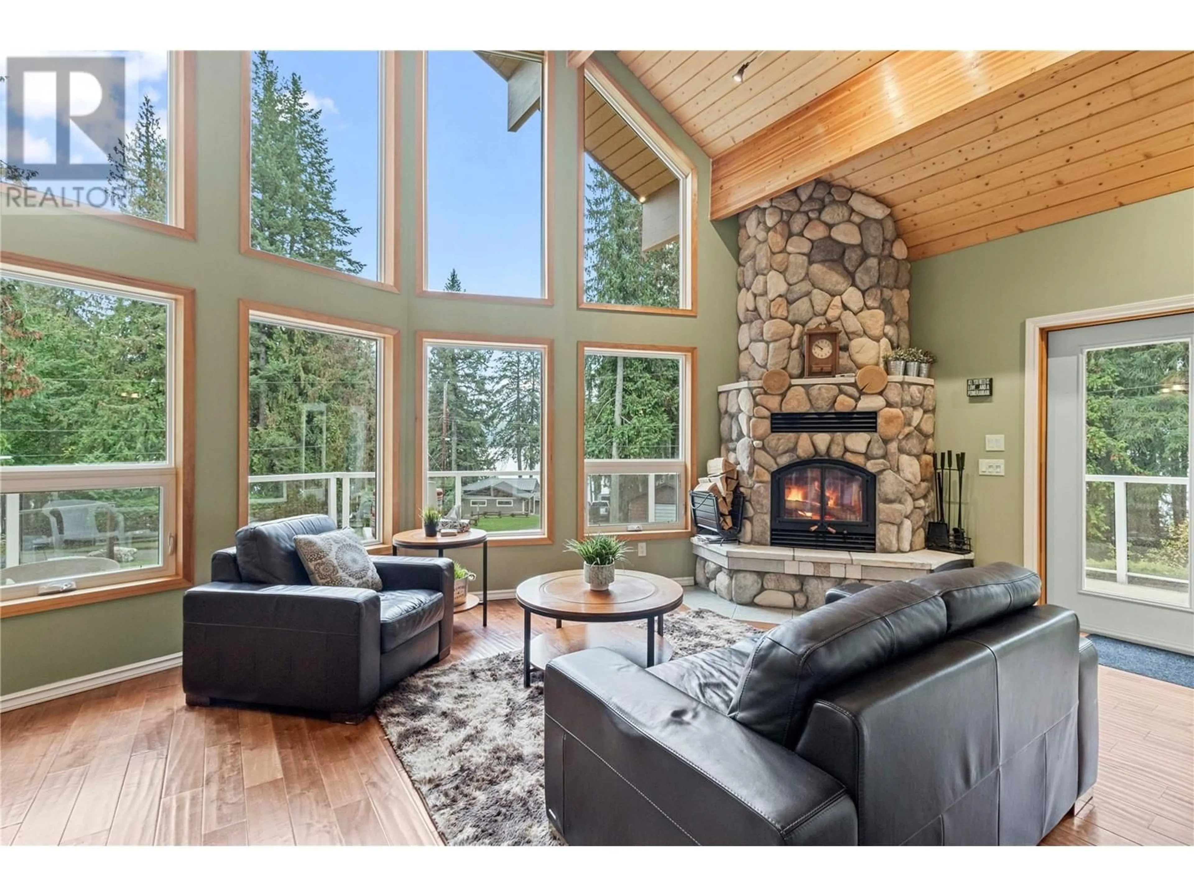 Living room, wood floors for 7889 Gardiner Road, Anglemont British Columbia V0E1M8