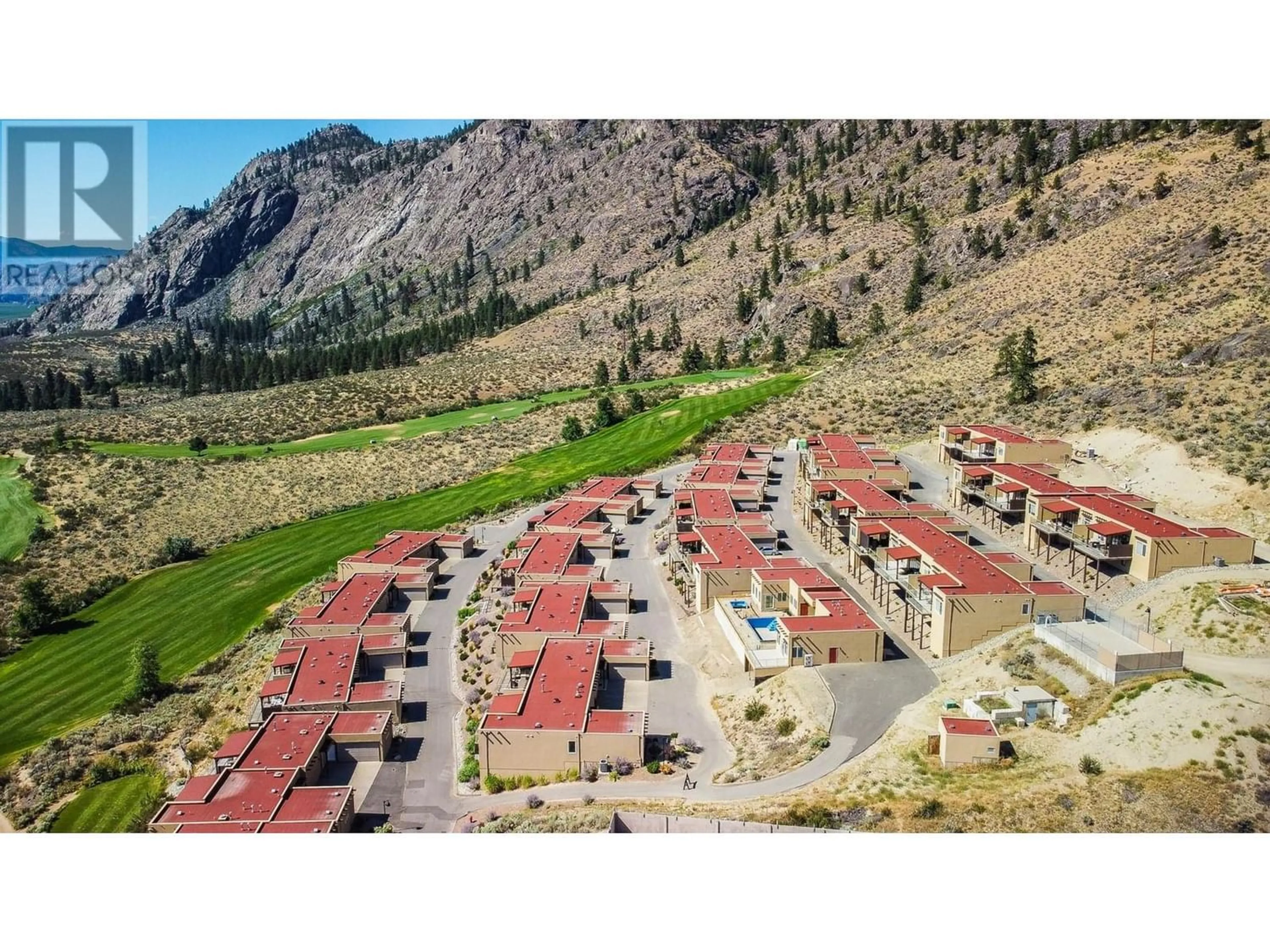 A pic from outside/outdoor area/front of a property/back of a property/a pic from drone, mountain view for 2000 VALLEYVIEW Drive Unit# 1, Osoyoos British Columbia V0H1V6