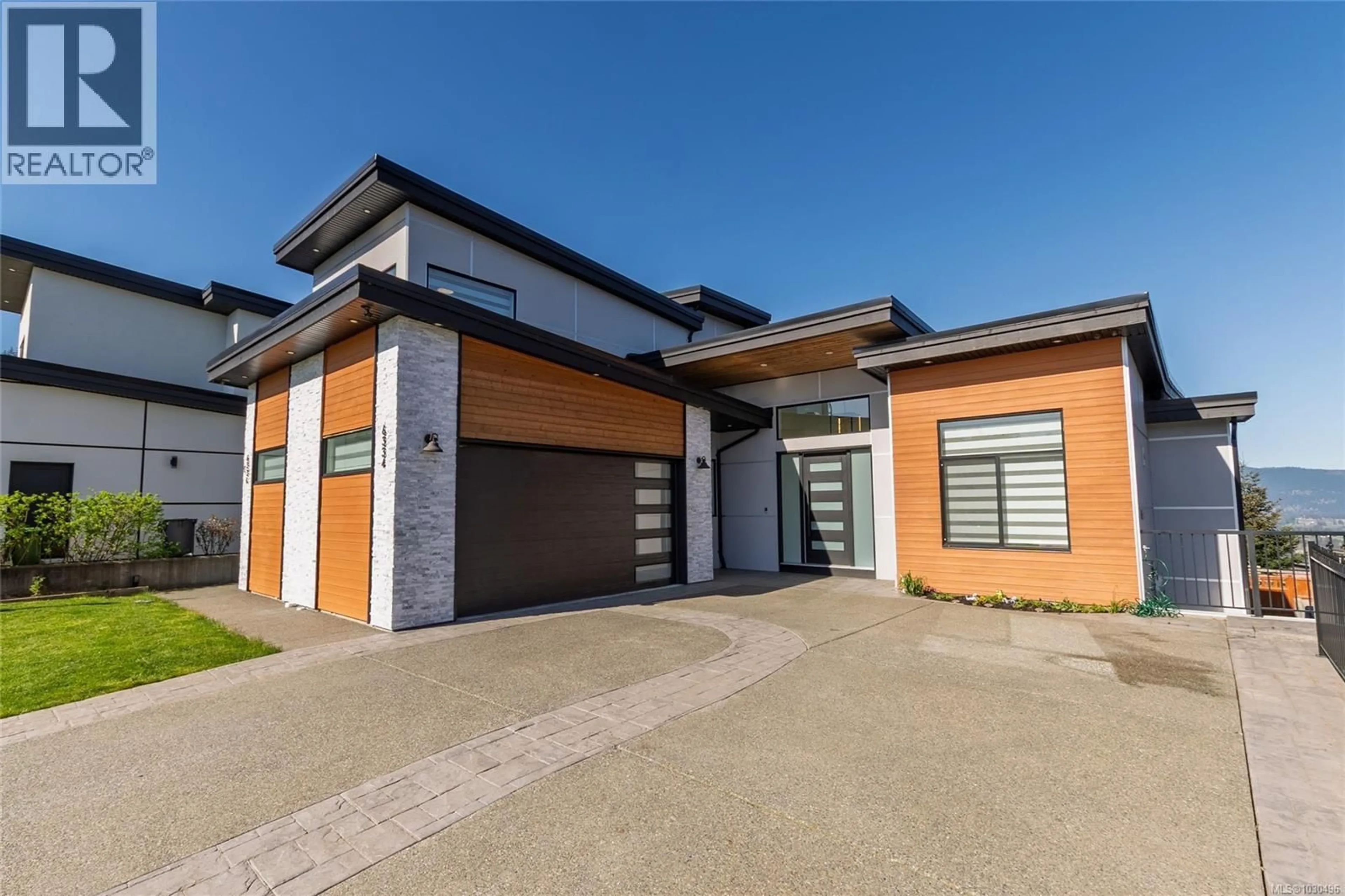 Home with brick exterior material, street for 6334 NEVILANE DRIVE, Duncan British Columbia V9L5S6