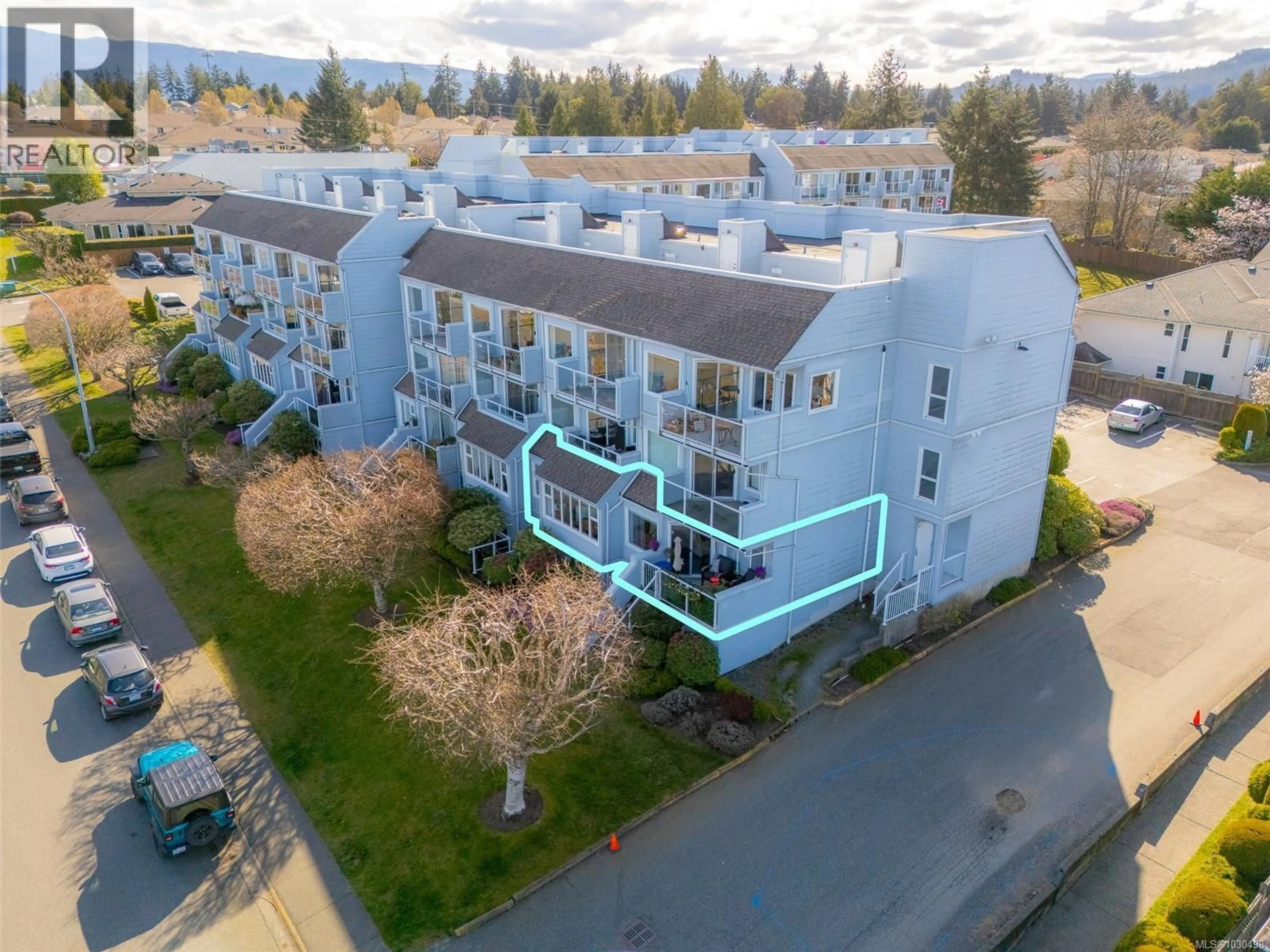 A pic from outside/outdoor area/front of a property/back of a property/a pic from drone, unknown for 102A - 6231 BLUEBACK ROAD, Nanaimo British Columbia V9V1J3