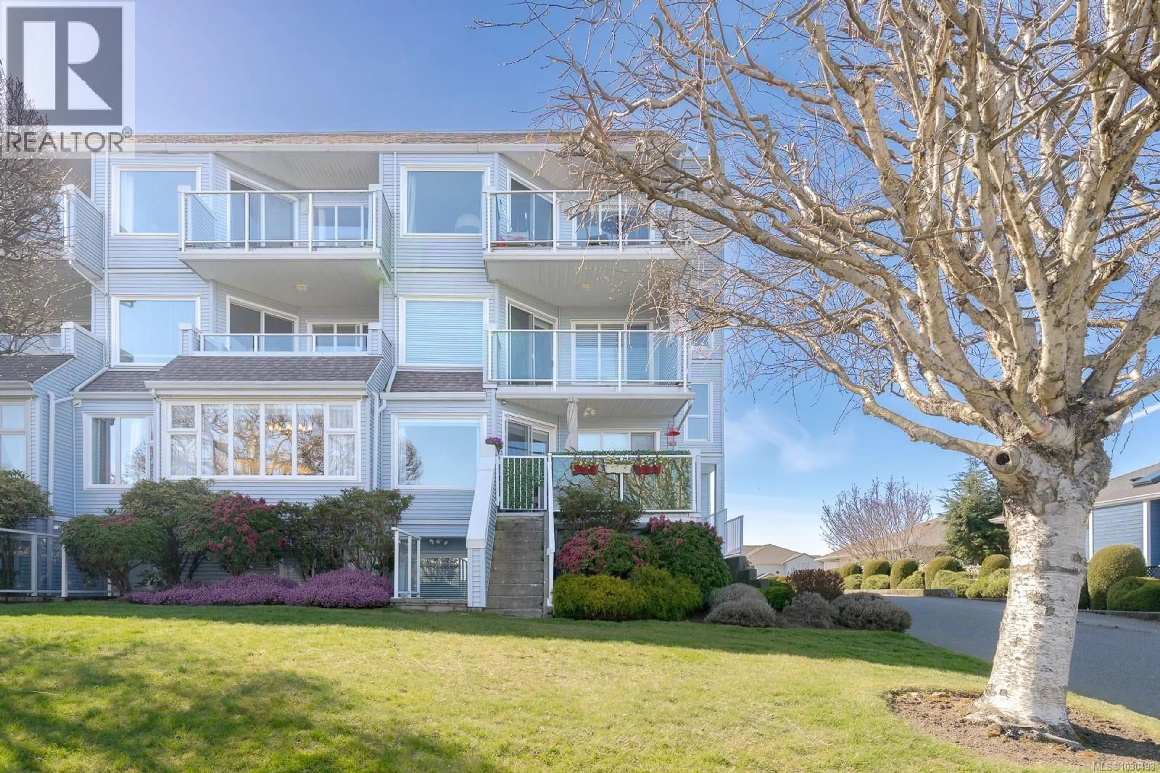 A pic from outside/outdoor area/front of a property/back of a property/a pic from drone, water/lake/river/ocean view for 102A - 6231 BLUEBACK ROAD, Nanaimo British Columbia V9V1J3