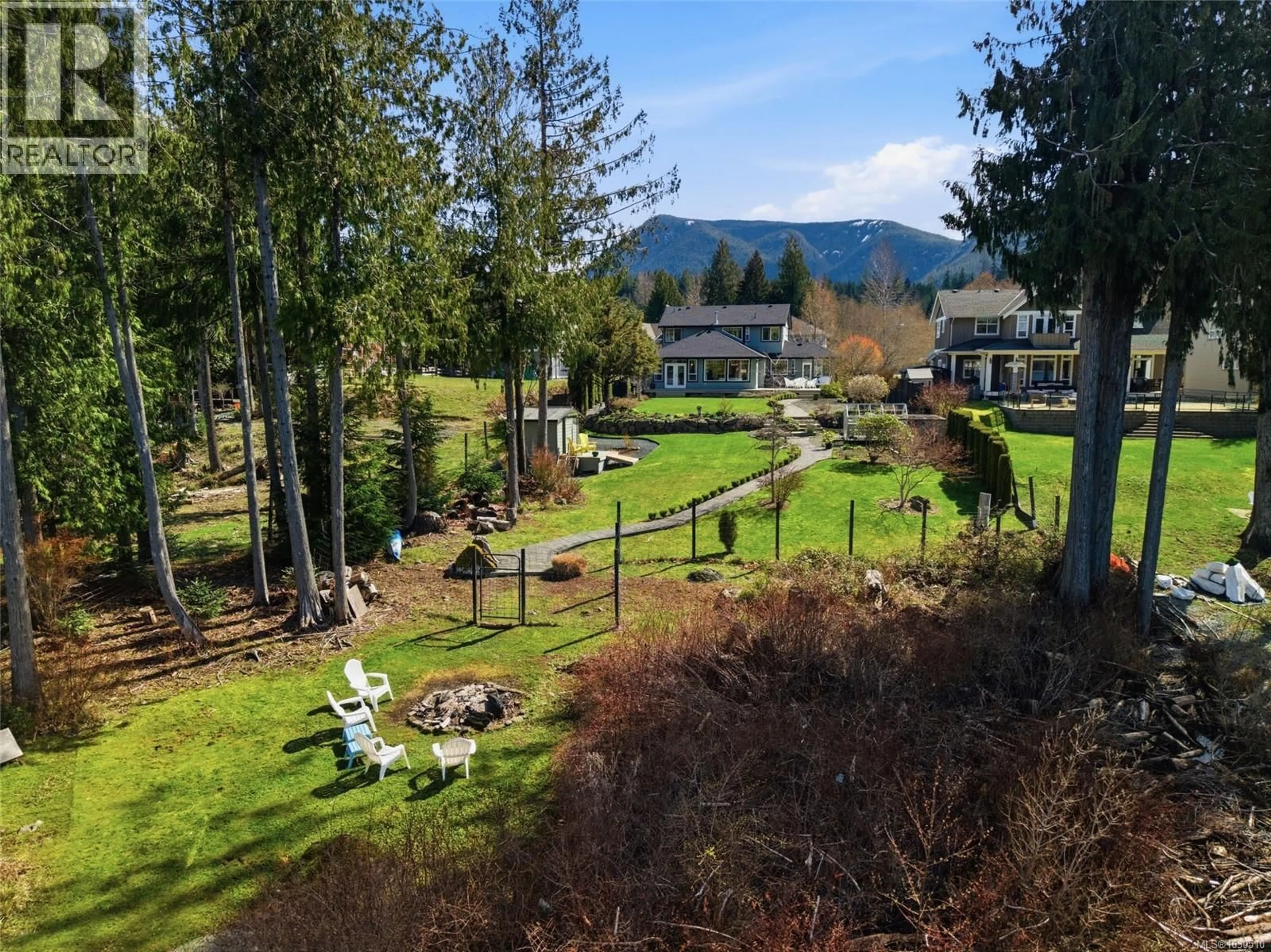 A pic from outside/outdoor area/front of a property/back of a property/a pic from drone, mountain view for 521 POINT IDEAL DRIVE, Lake Cowichan British Columbia V0R2G0