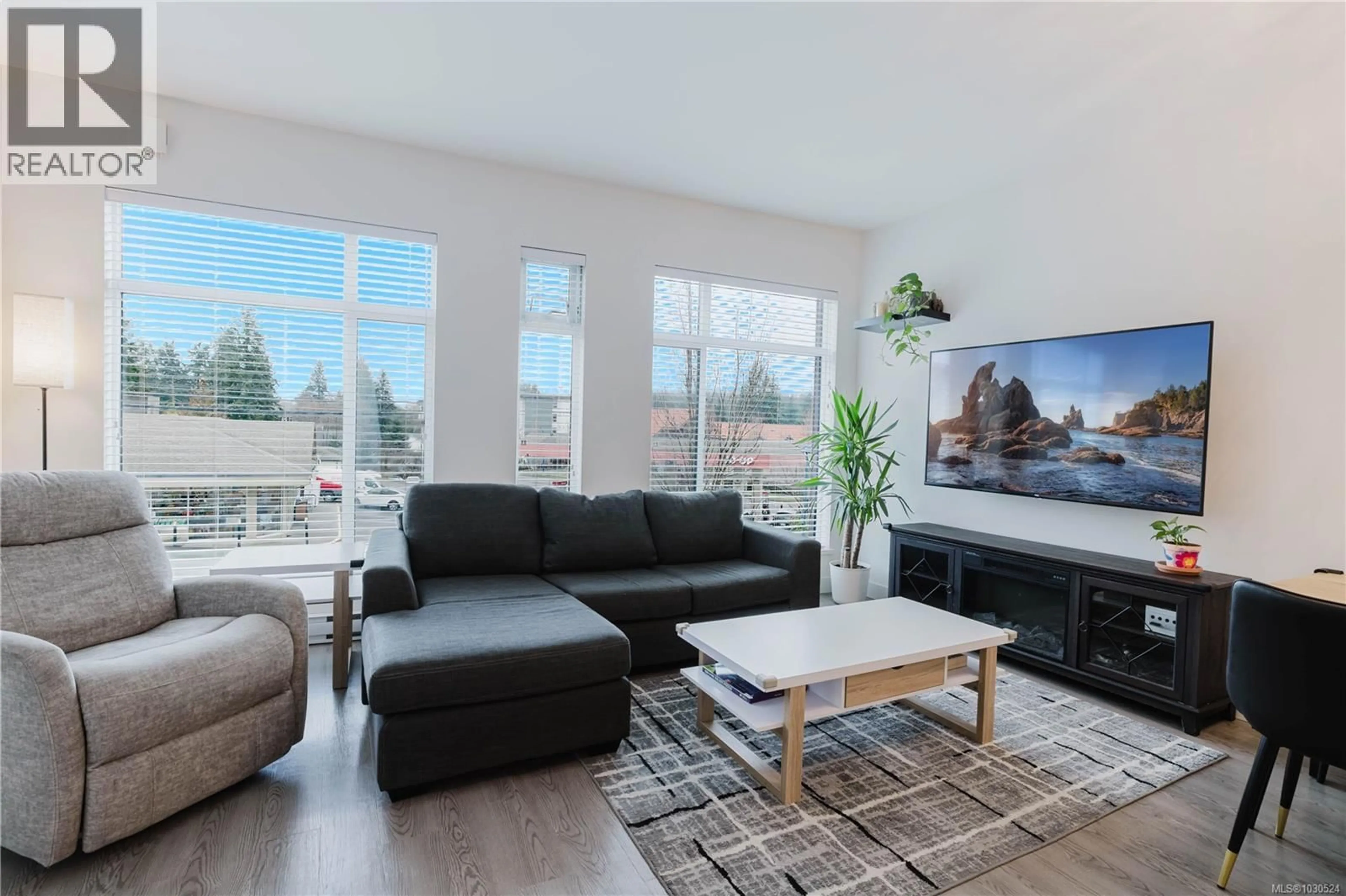 Living room with furniture, unknown for 202 - 707 TREANOR AVENUE, Langford British Columbia V9B0X7