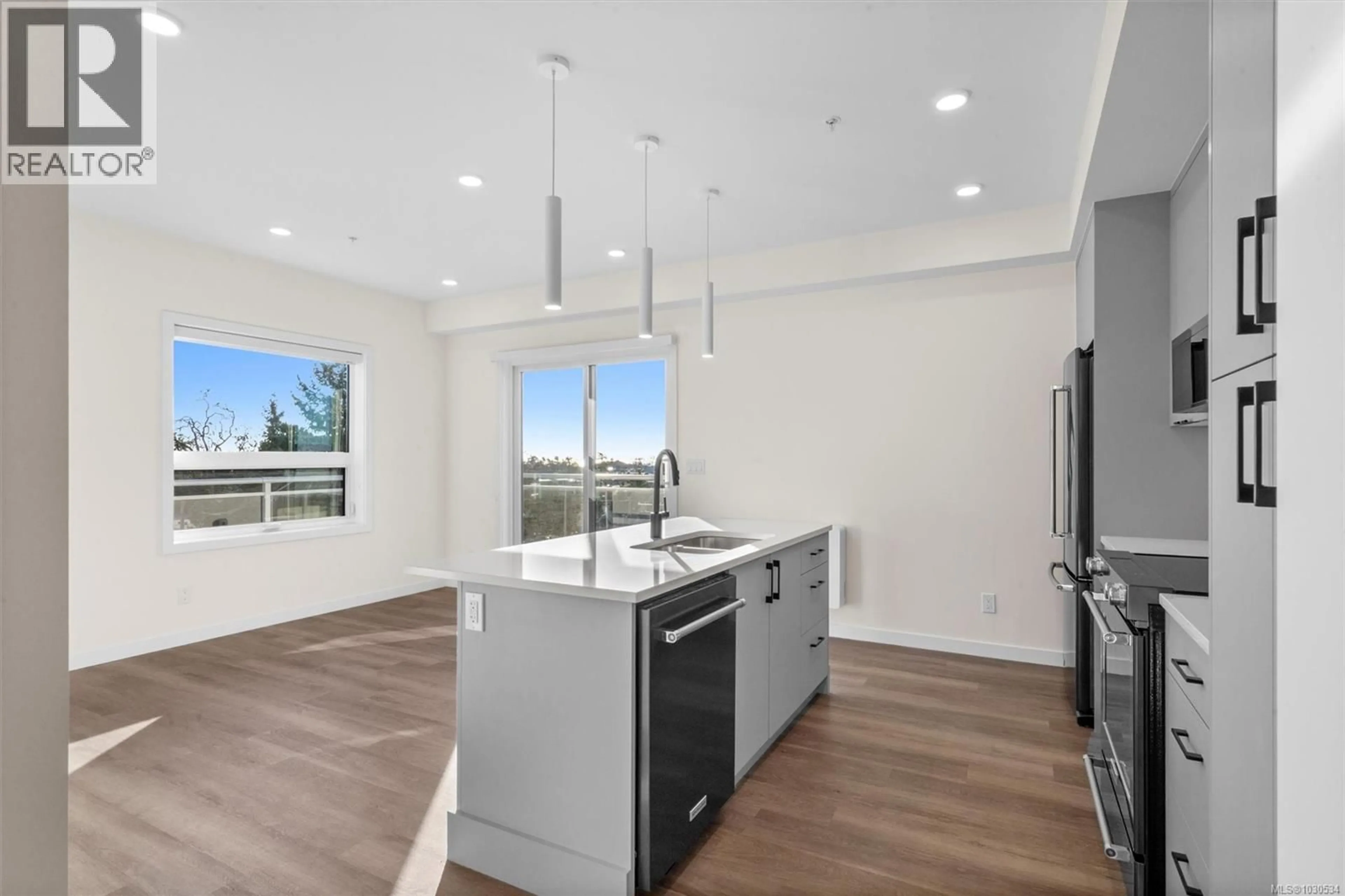 Open concept kitchen, unknown for 410 - 1102 ESQUIMALT ROAD, Esquimalt British Columbia V9A0L3