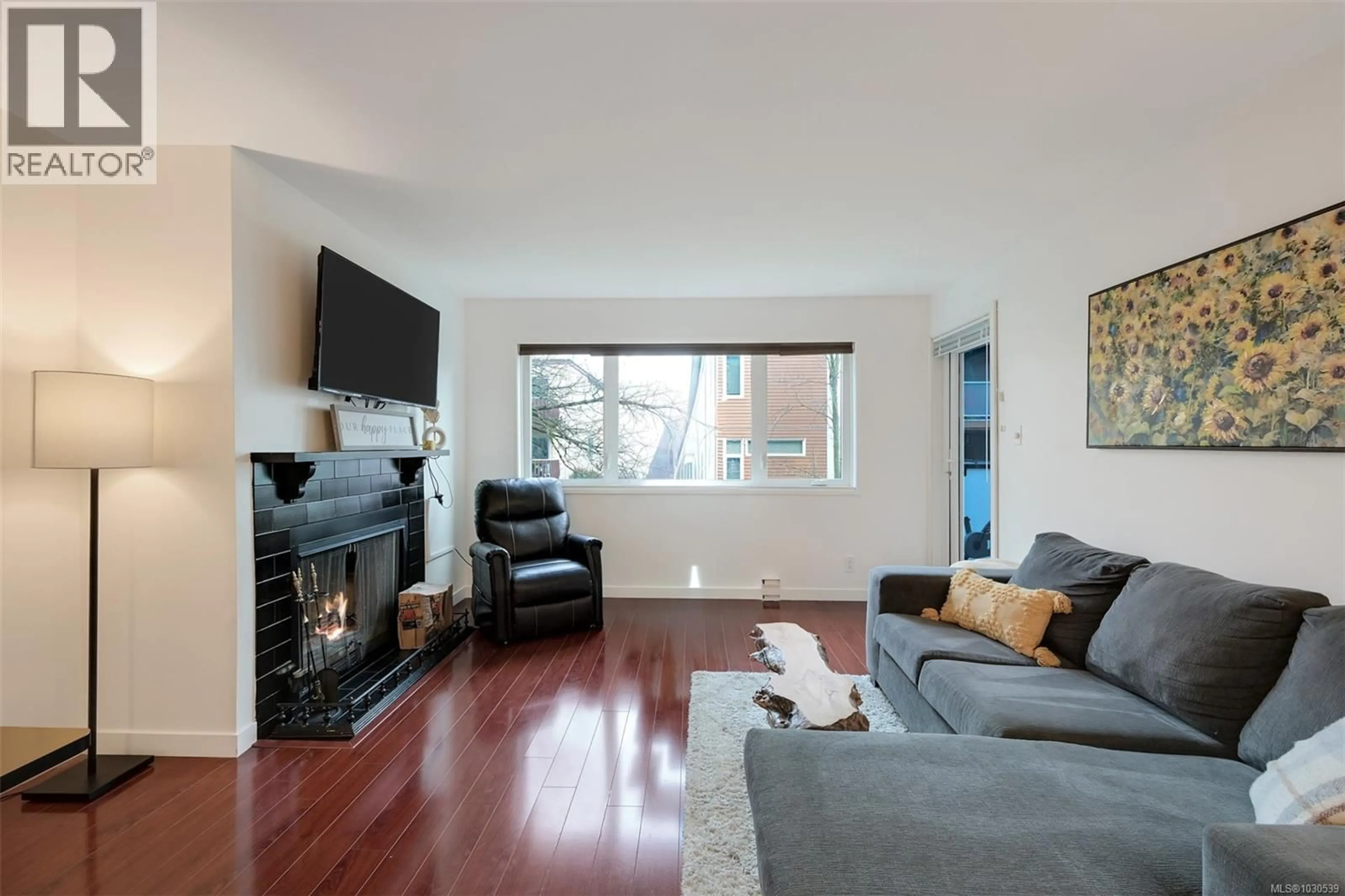 Living room with furniture, wood/laminate floor for 201 - 1619 MORRISON STREET, Victoria British Columbia V8R6R8
