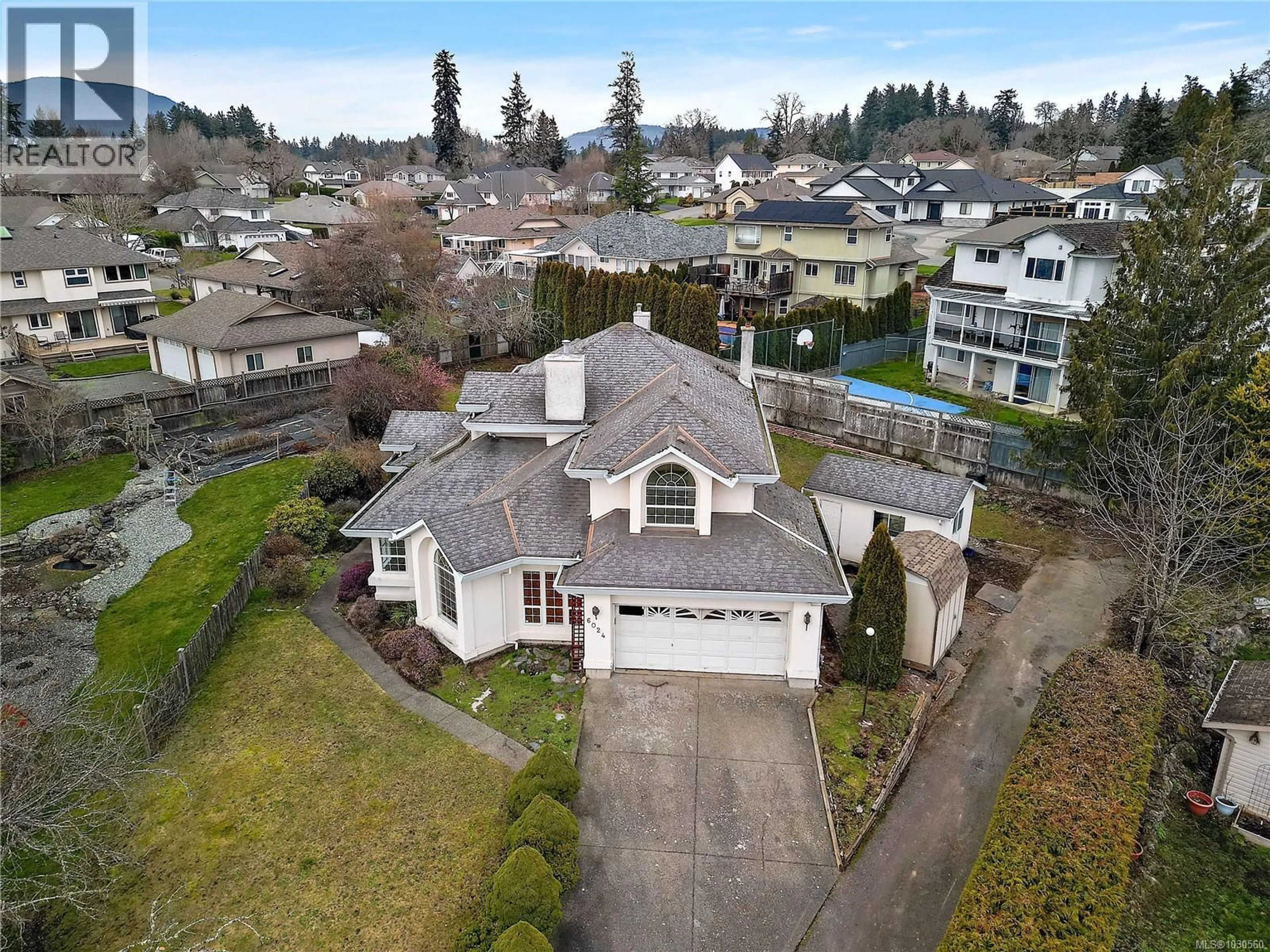 A pic from outside/outdoor area/front of a property/back of a property/a pic from drone, street for 6024 COLUMBINE ROAD, Duncan British Columbia V9L5G8