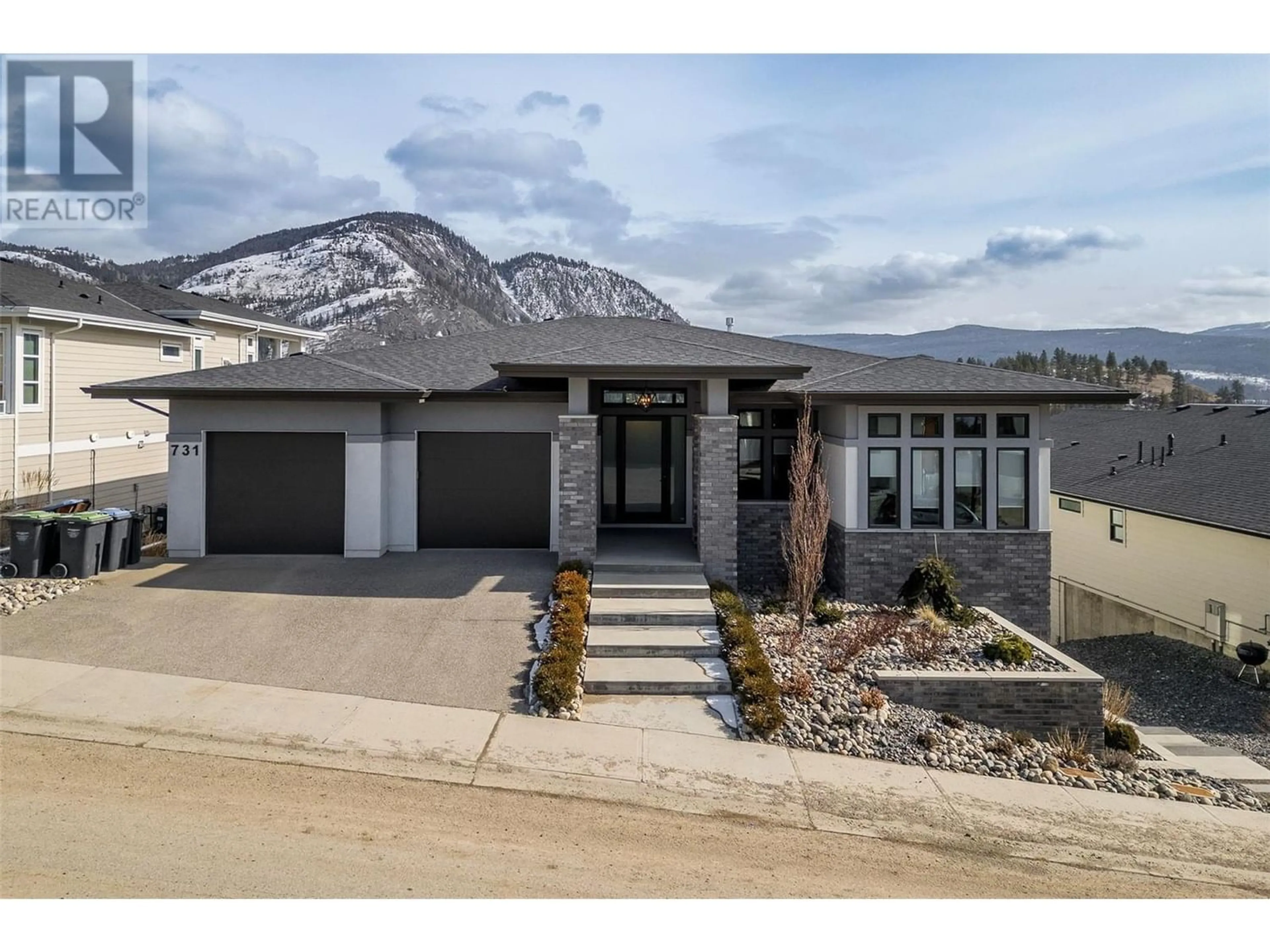 Frontside or backside of a home for 731 Carnoustie Drive, Kelowna British Columbia V1P1V2