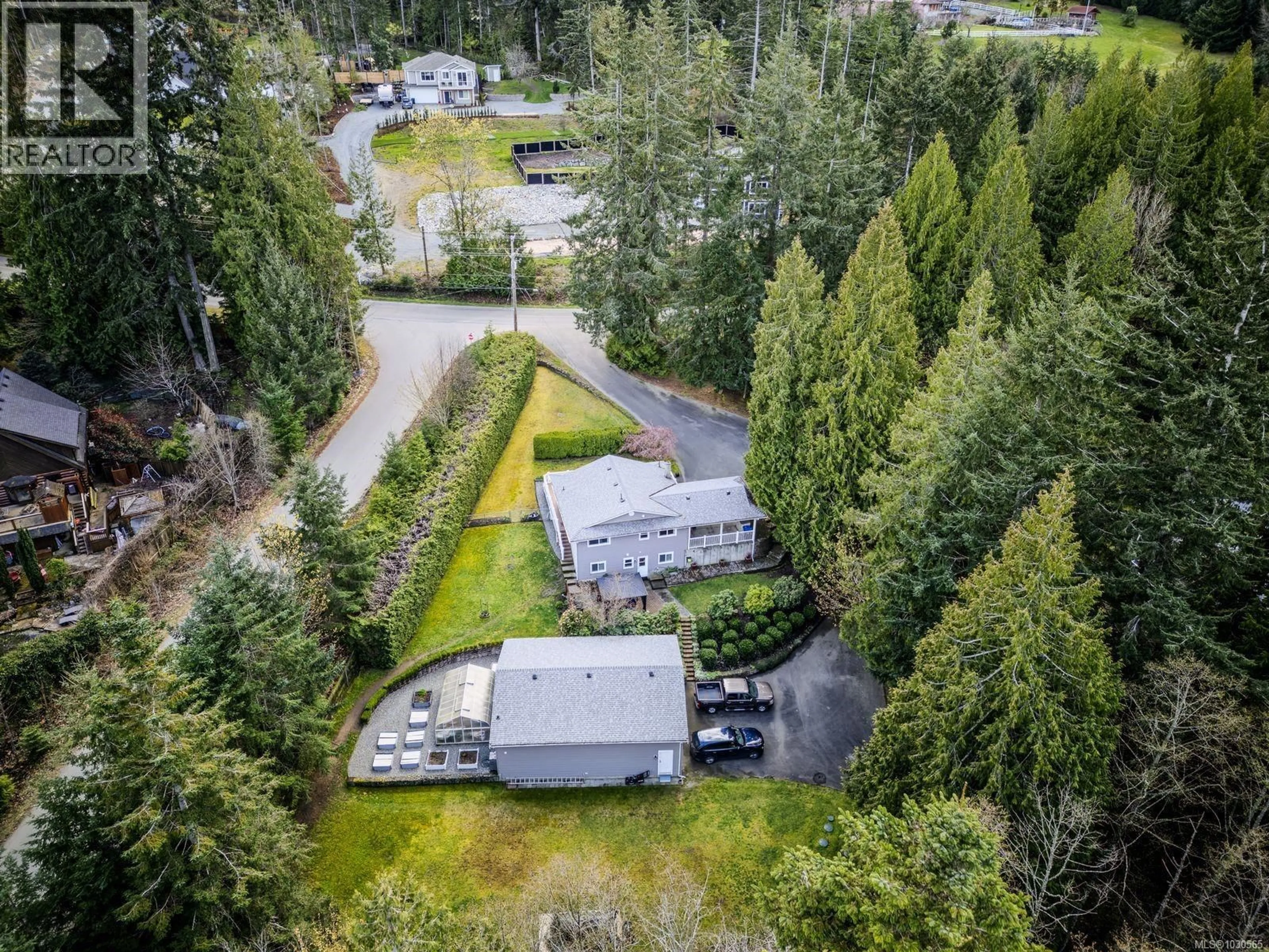 A pic from outside/outdoor area/front of a property/back of a property/a pic from drone, forest/trees view for 7228 AULDS ROAD, Lantzville British Columbia V0R2H0