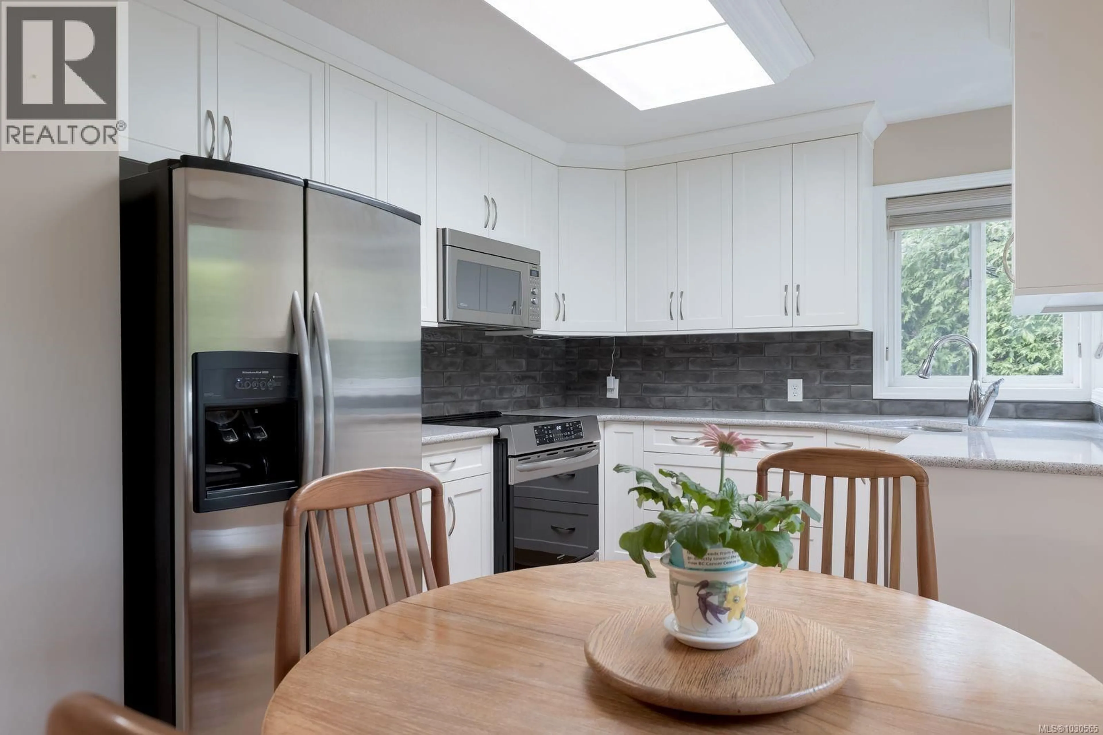 Contemporary kitchen, ceramic/tile floor for 7228 AULDS ROAD, Lantzville British Columbia V0R2H0