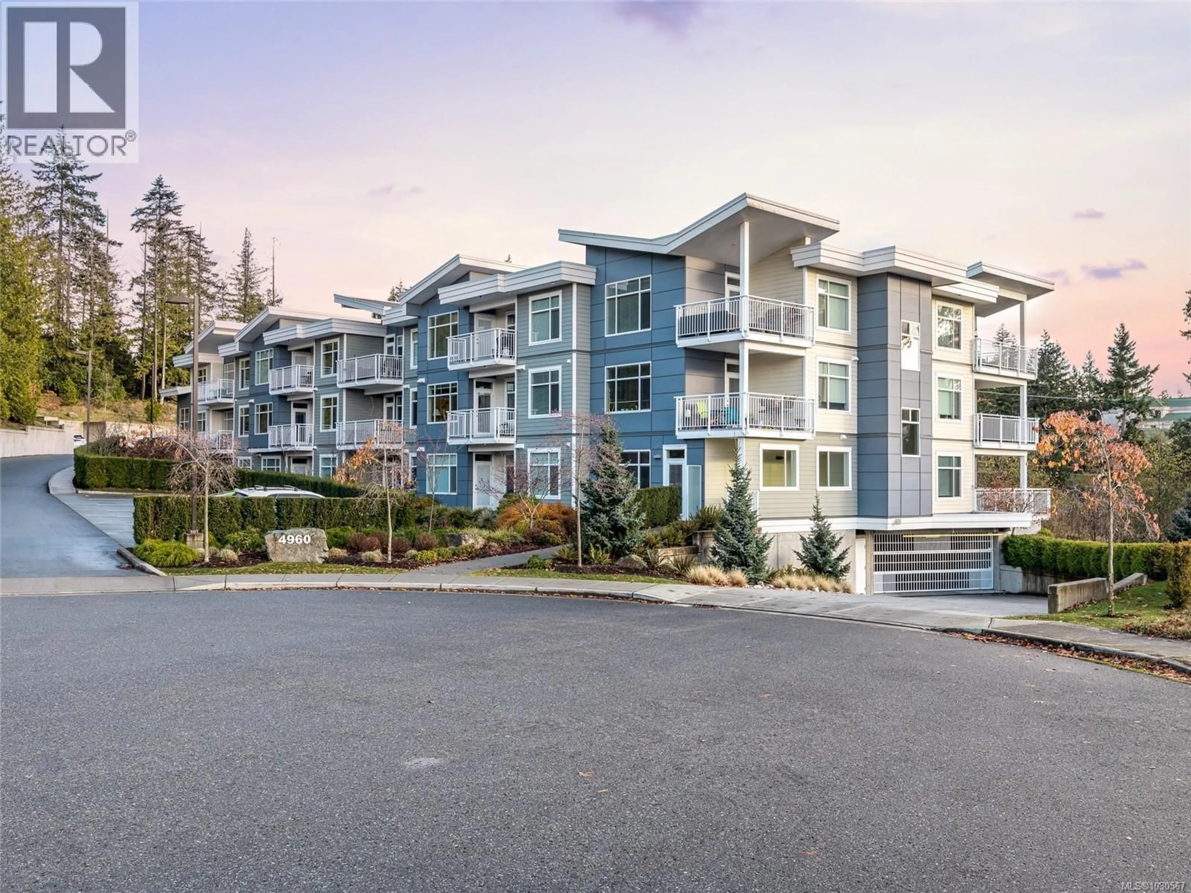 A pic from outside/outdoor area/front of a property/back of a property/a pic from drone, mountain view for 205 - 4960 SONGBIRD PLACE, Nanaimo British Columbia V9T0H7