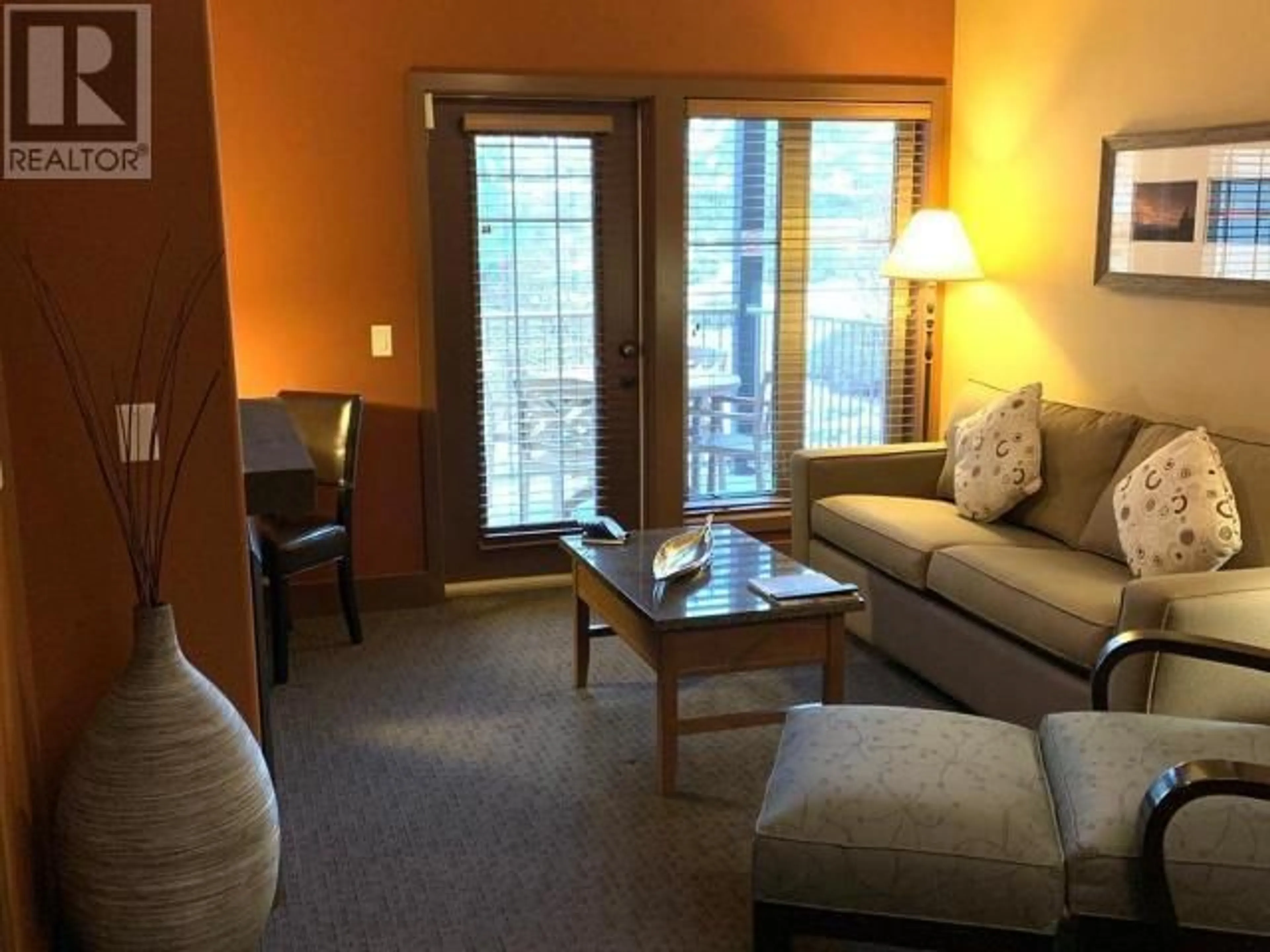 Living room with furniture, wood/laminate floor for 434C - 1200 RANCHER CREEK ROAD, Osoyoos British Columbia V0H1V6