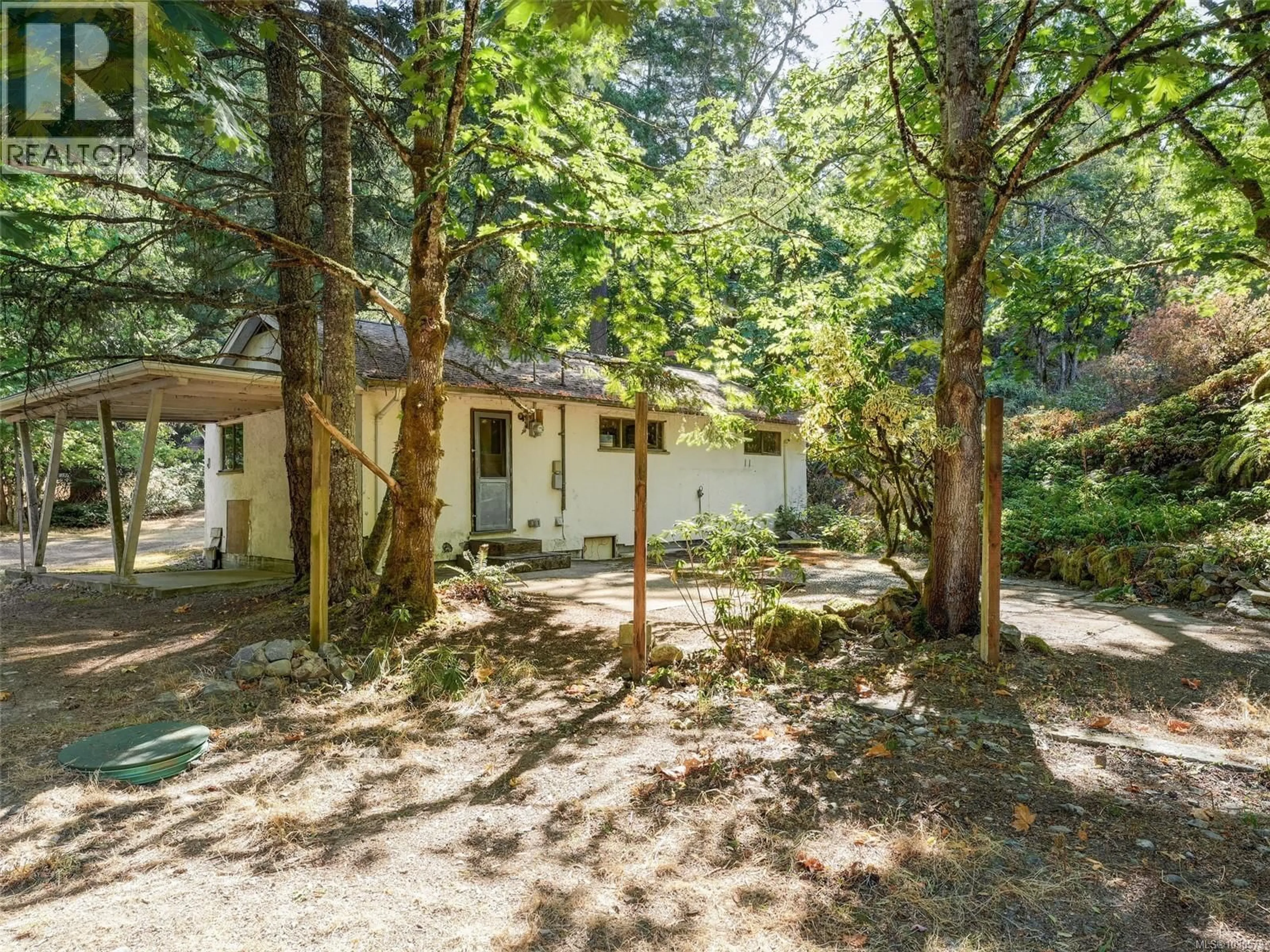A pic from outside/outdoor area/front of a property/back of a property/a pic from drone, forest/trees view for 5142 WEST SAANICH ROAD, Saanich British Columbia V9E2E7