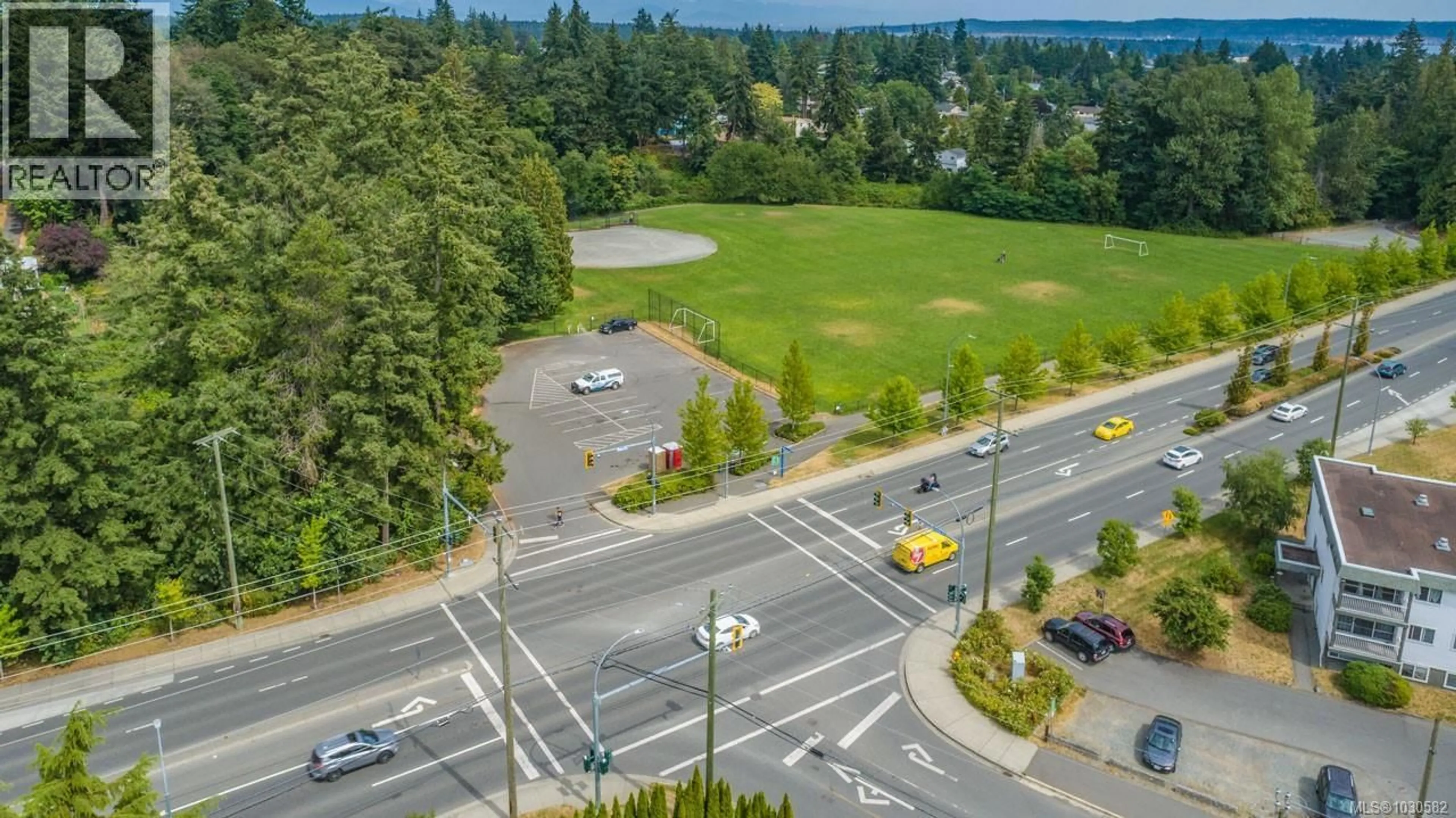 A pic from outside/outdoor area/front of a property/back of a property/a pic from drone, unknown for 1102 - 1097 BOWEN ROAD, Nanaimo British Columbia V9R2A4