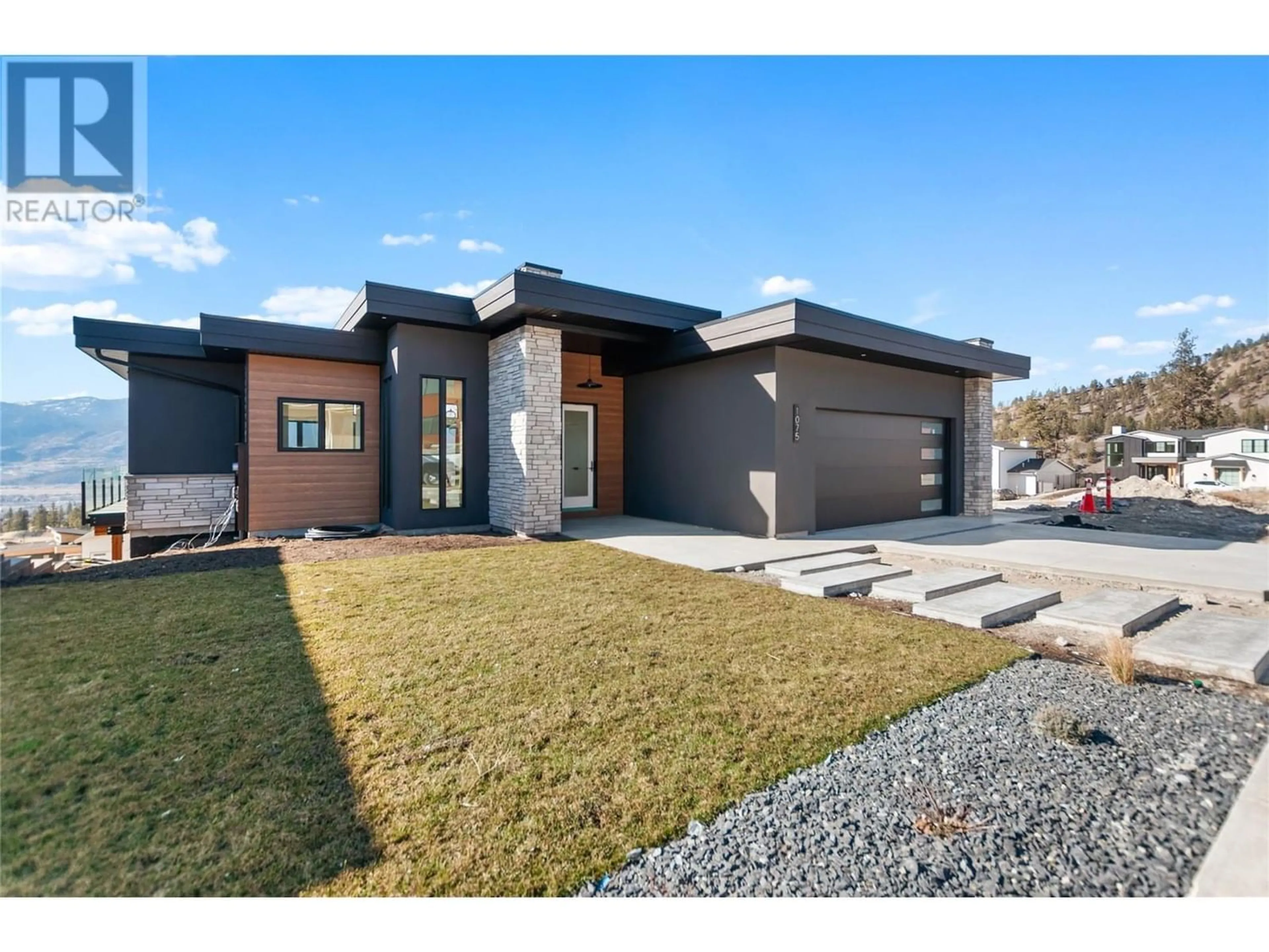 Home with brick exterior material for 1075 Elk Street, Penticton British Columbia V2A0C9