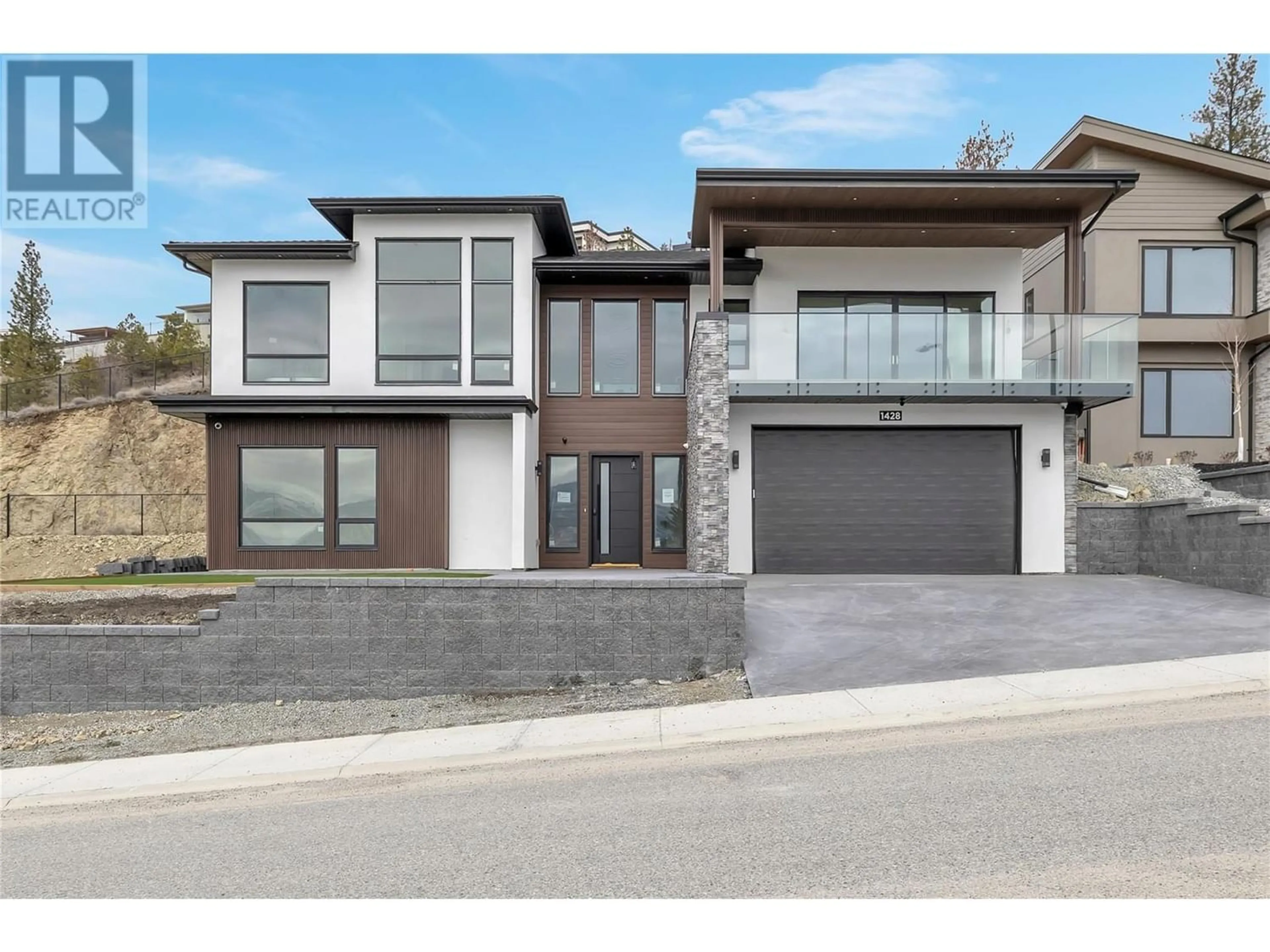 Frontside or backside of a home for 1428 Vineyard Drive, West Kelowna British Columbia V4T2V8