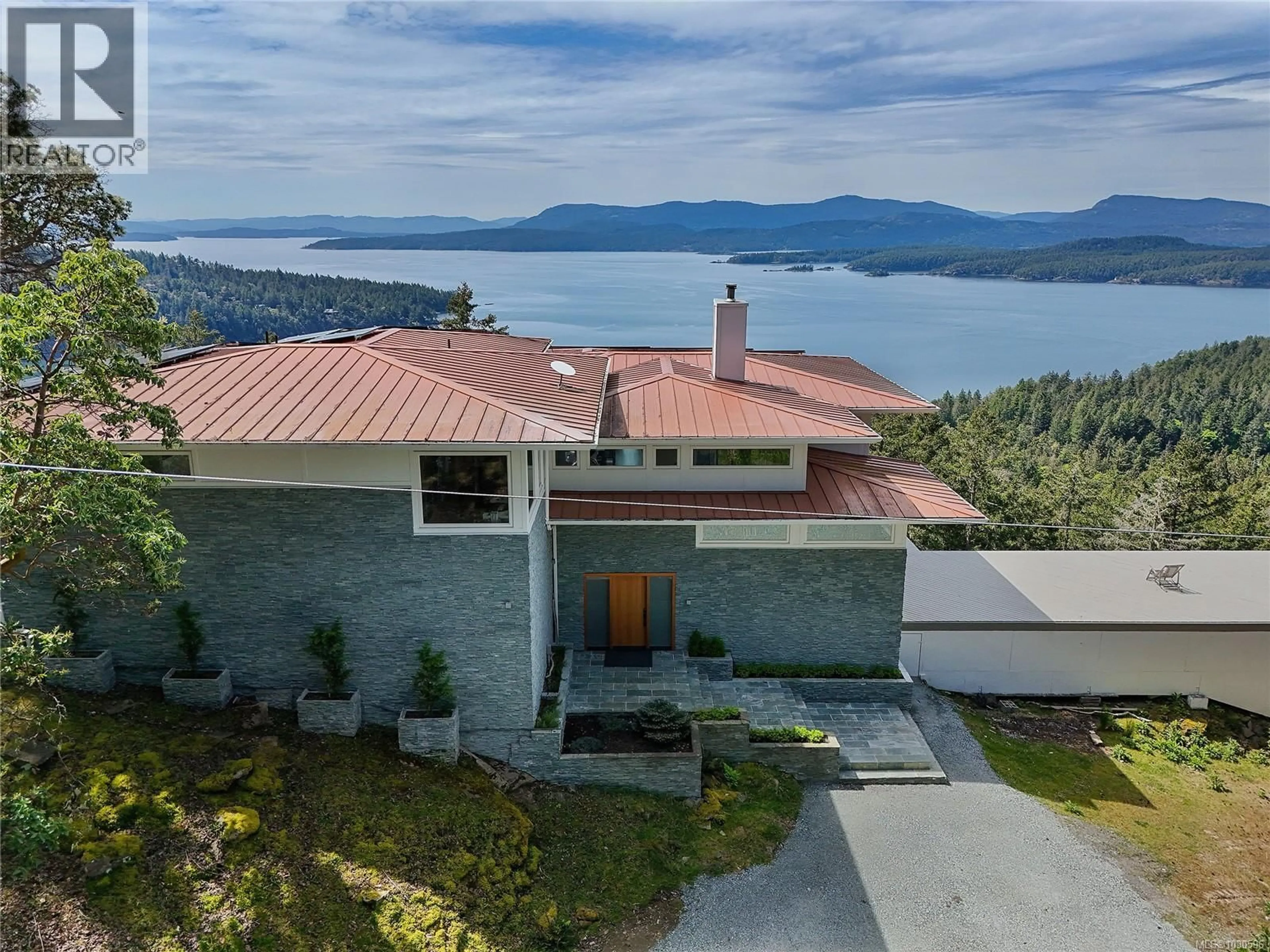 A pic from outside/outdoor area/front of a property/back of a property/a pic from drone, water/lake/river/ocean view for 356 EAST WEST ROAD, Mayne Island British Columbia V0N2J2