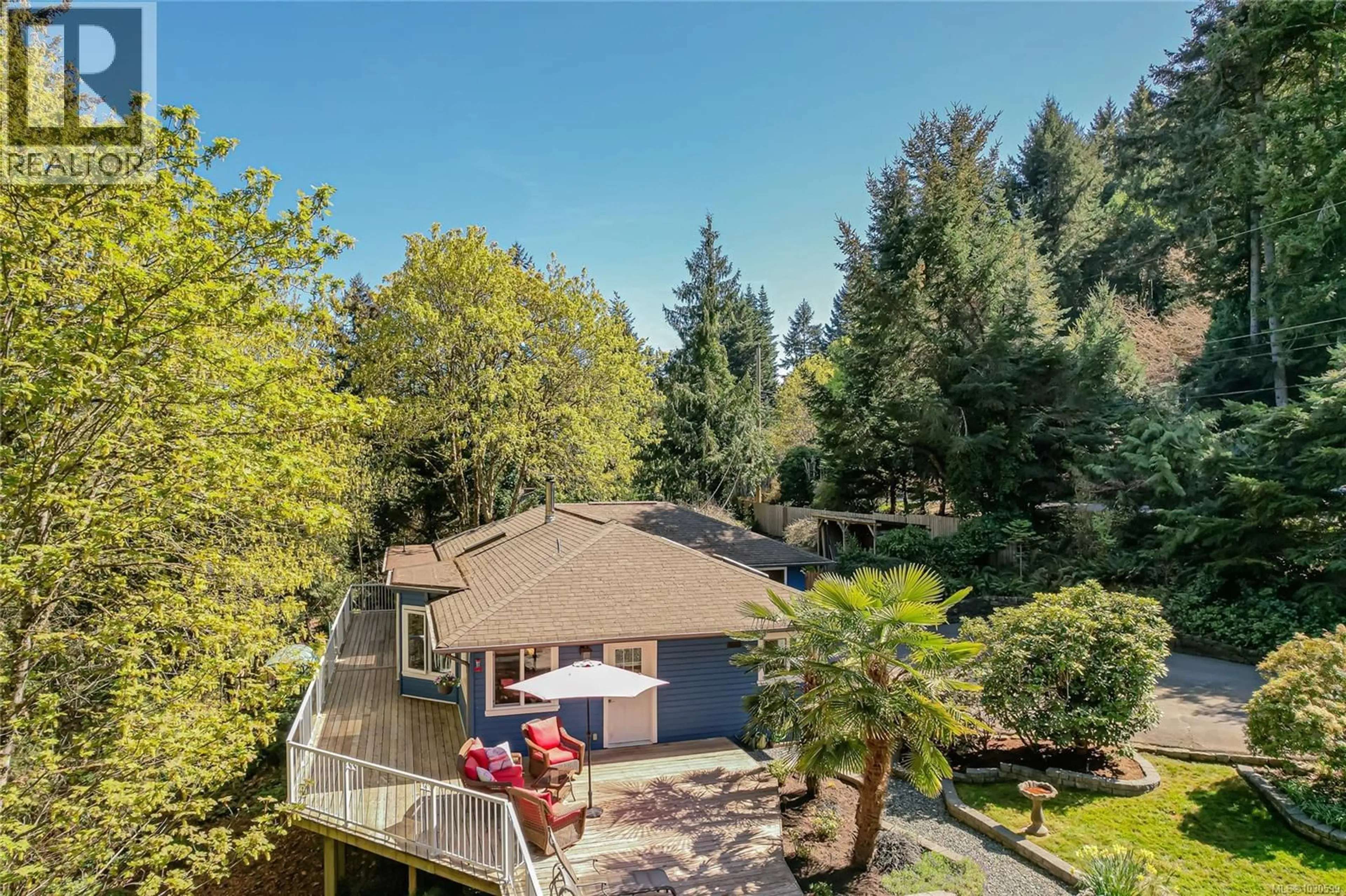 A pic from outside/outdoor area/front of a property/back of a property/a pic from drone, forest/trees view for 170 WOODLAND DRIVE, Salt Spring British Columbia V8K1K2