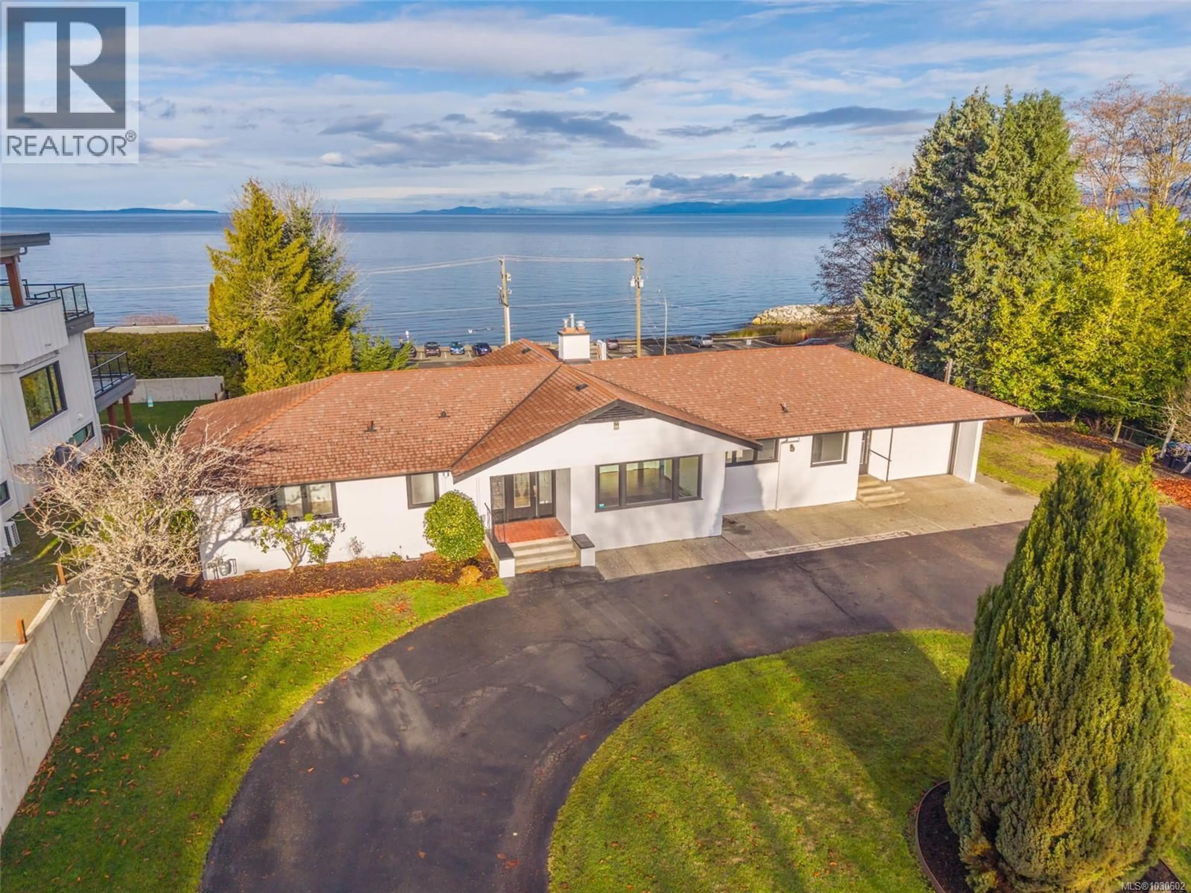 A pic from outside/outdoor area/front of a property/back of a property/a pic from drone, water/lake/river/ocean view for 441 MEMORIAL AVENUE, Qualicum Beach British Columbia V9K1G8