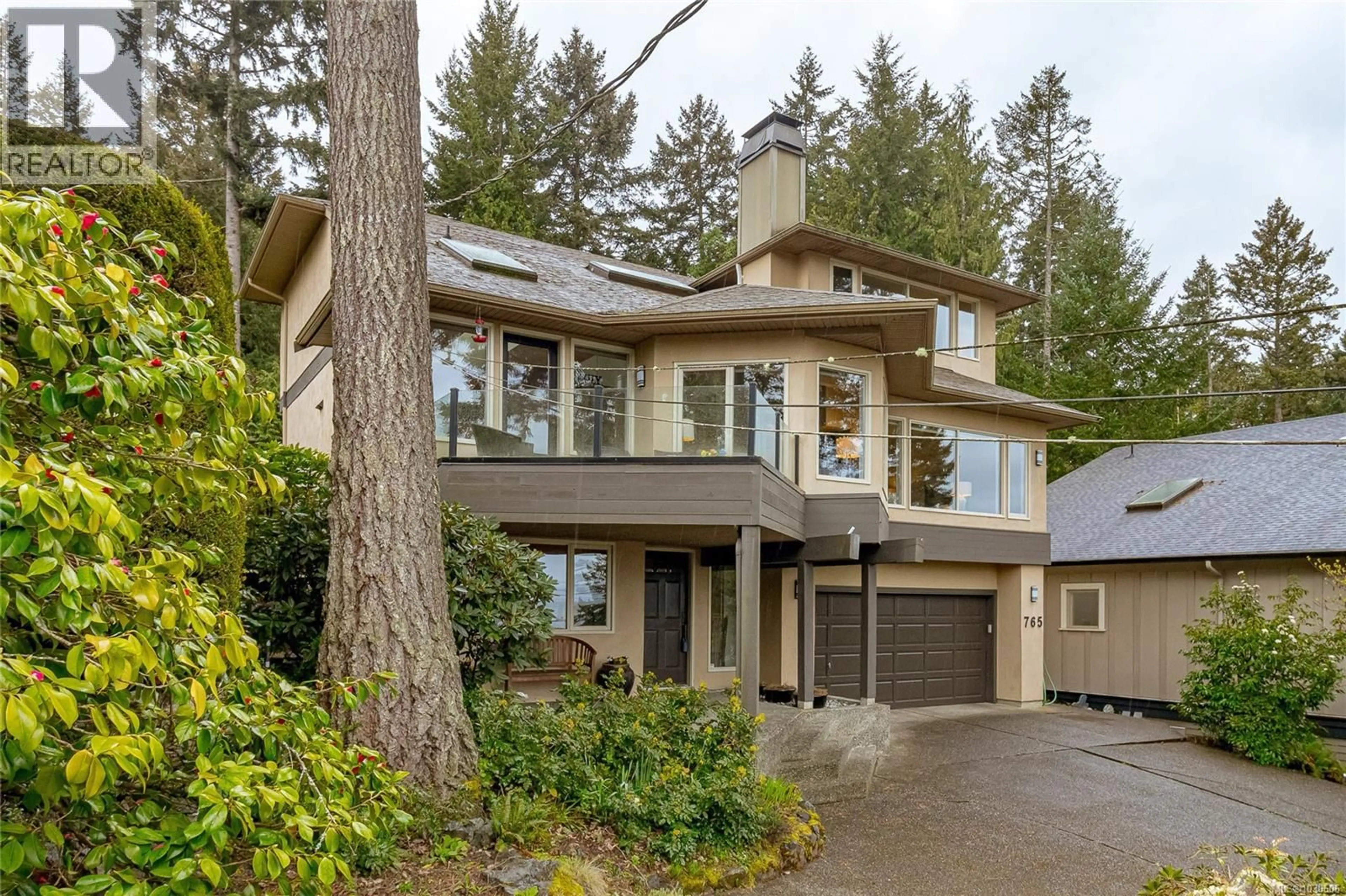 Home with vinyl exterior material, street for 765 SEA DRIVE, Central Saanich British Columbia V8M1B1