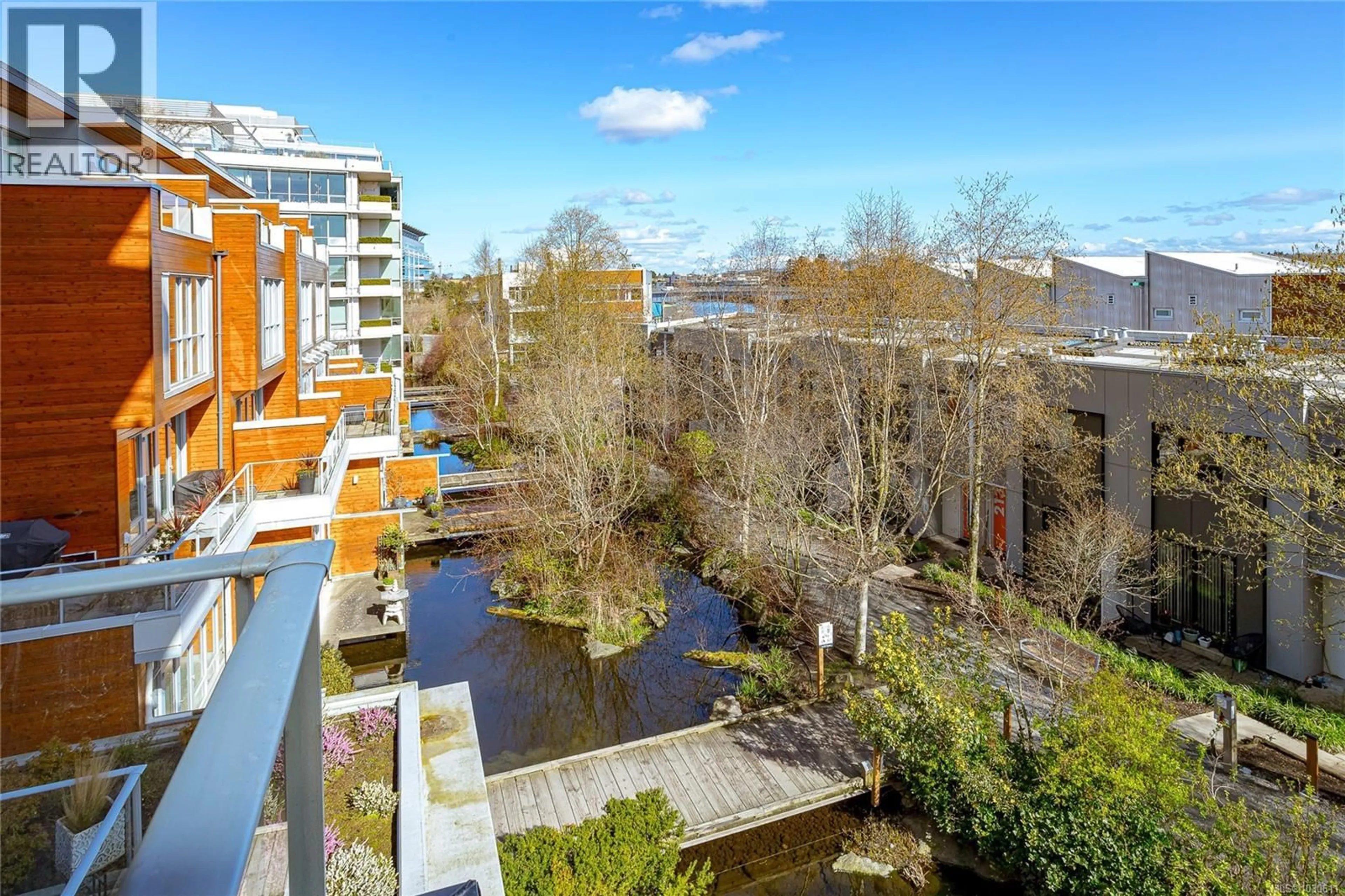 A pic from outside/outdoor area/front of a property/back of a property/a pic from drone, city buildings view from balcony for 203 - 379 TYEE ROAD, Victoria British Columbia V9A0B4
